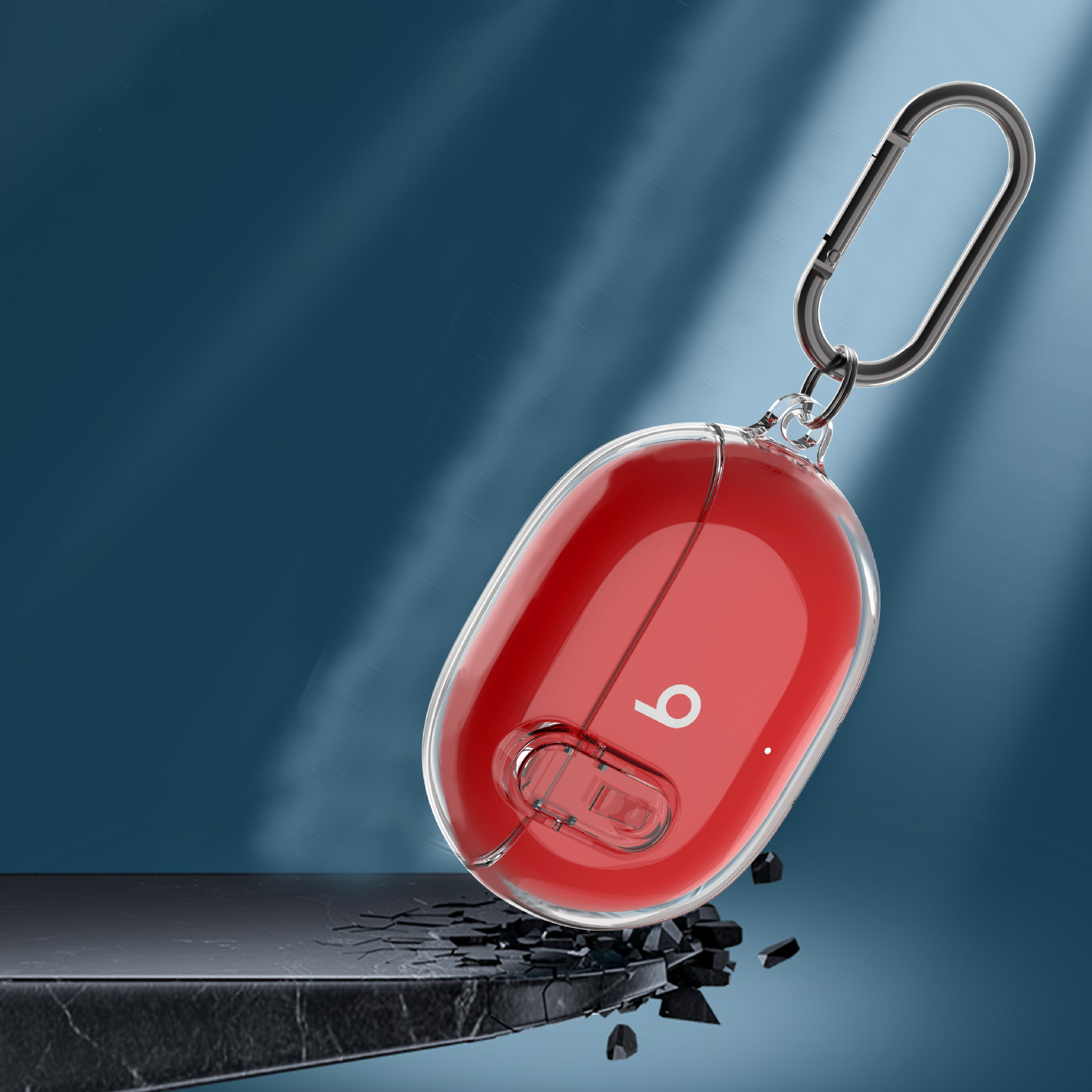 Custodia rossa per auricolari Beats in una custodia di plastica trasparente con moschettone argentato.