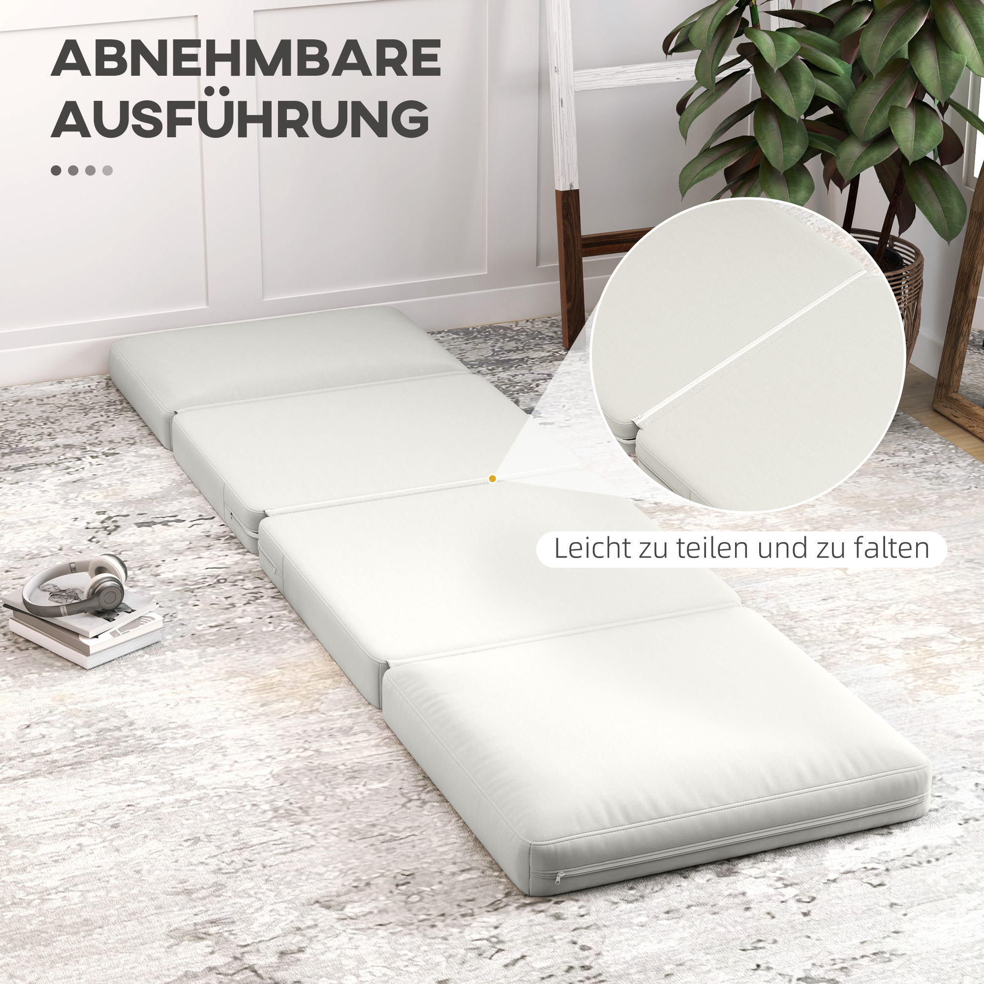 Weiße Klappmatratze, leicht zu teilen und zu falten, auf einem gemusterten, neutralen Teppich platziert.