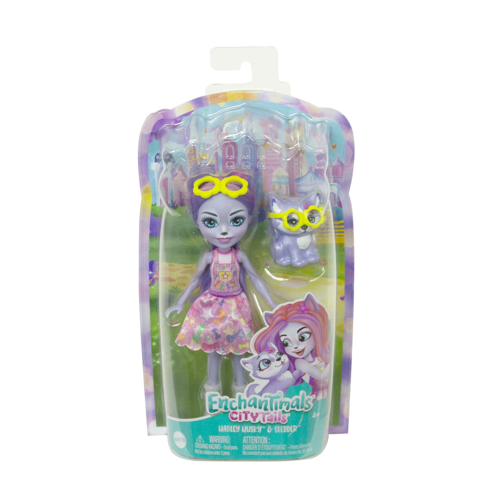 Enchantimals-Puppe in einer Verpackung mit Katzenspielzeug und Zubehör.