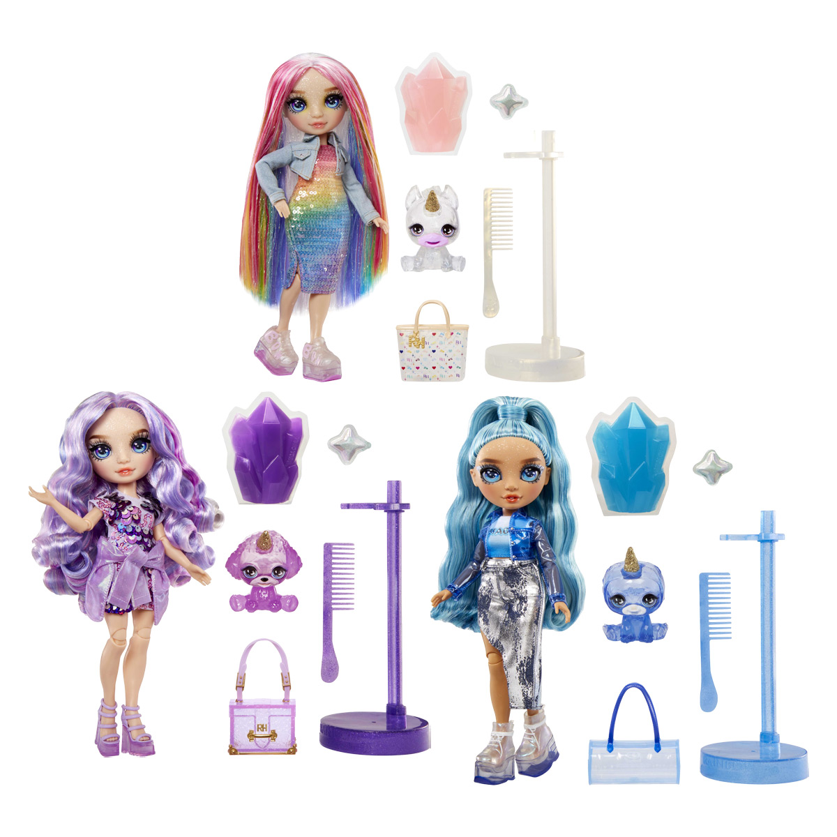 Trzy lalki z akcesoriami: fioletowe, tęczowe i niebieskie włosy. Każda ma akcesoria, takie jak zwierzęta i stojaki.