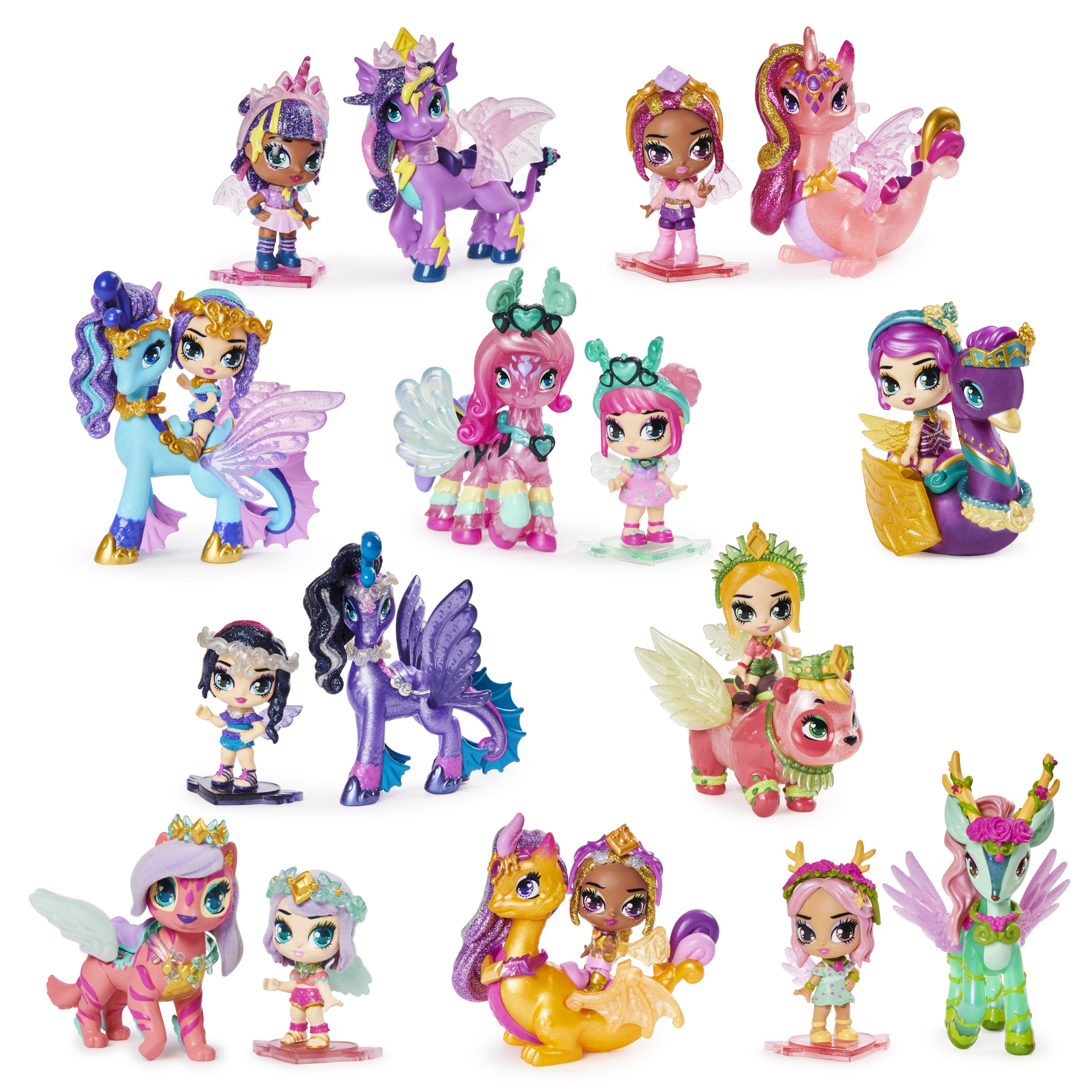 Se muestran varias figuras de juguete de muñecas y unicornios con alas. Son de varios colores y estilos.