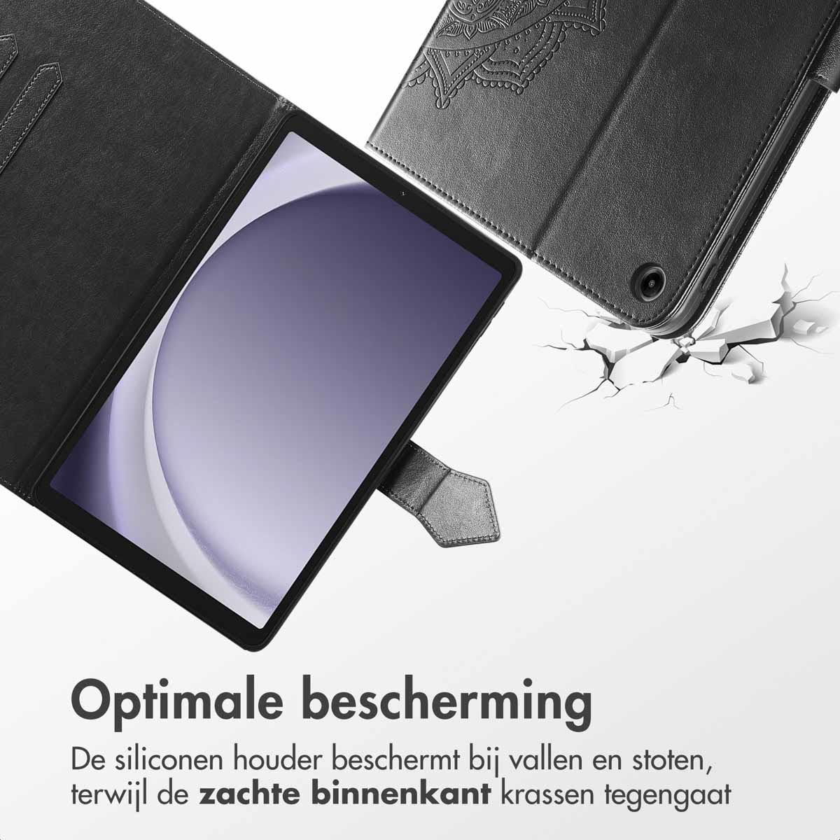 A black tablet in a black case, with a broken surface, and text. White background.
