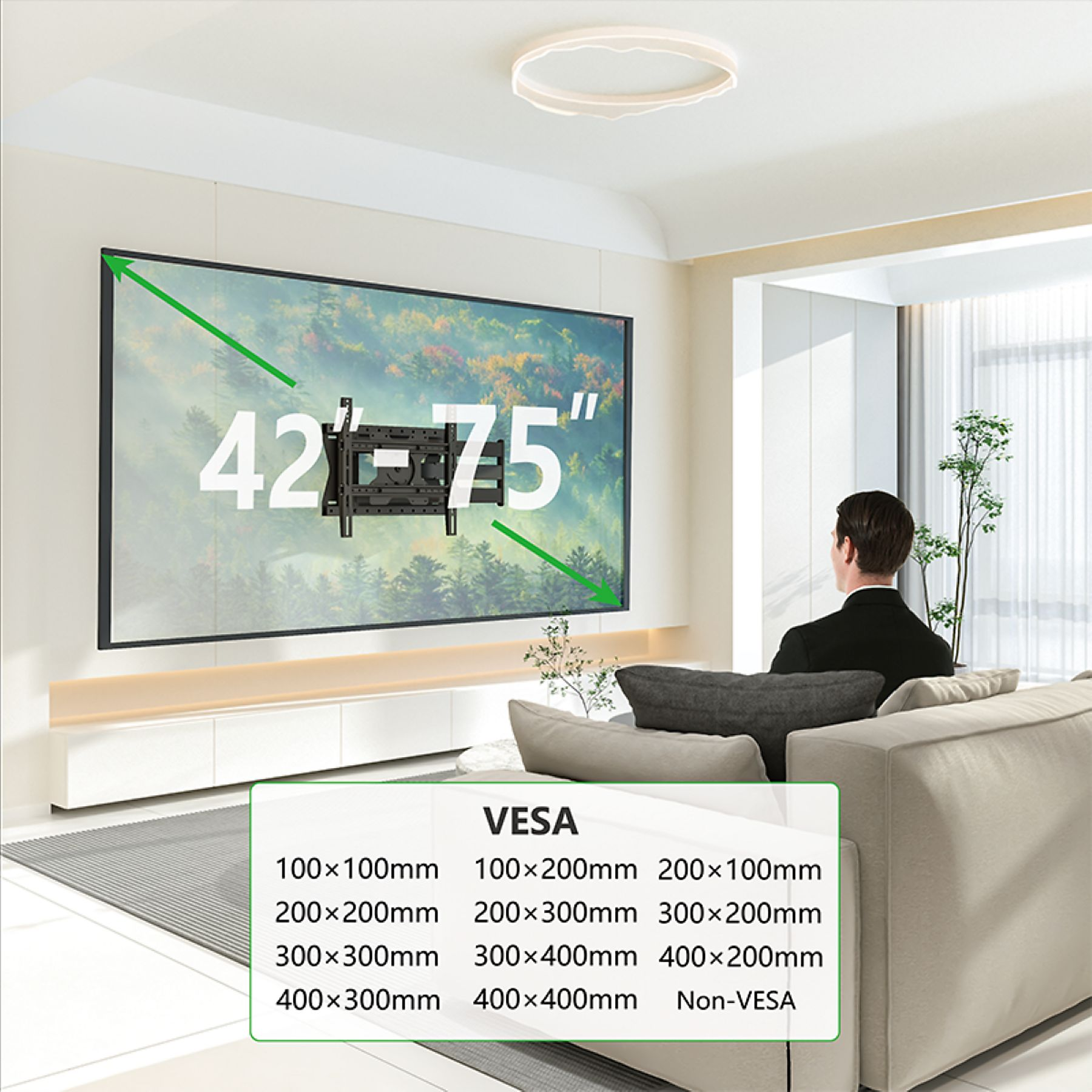 TV aan de muur, met VESA-maten en een man die op een bank zit.