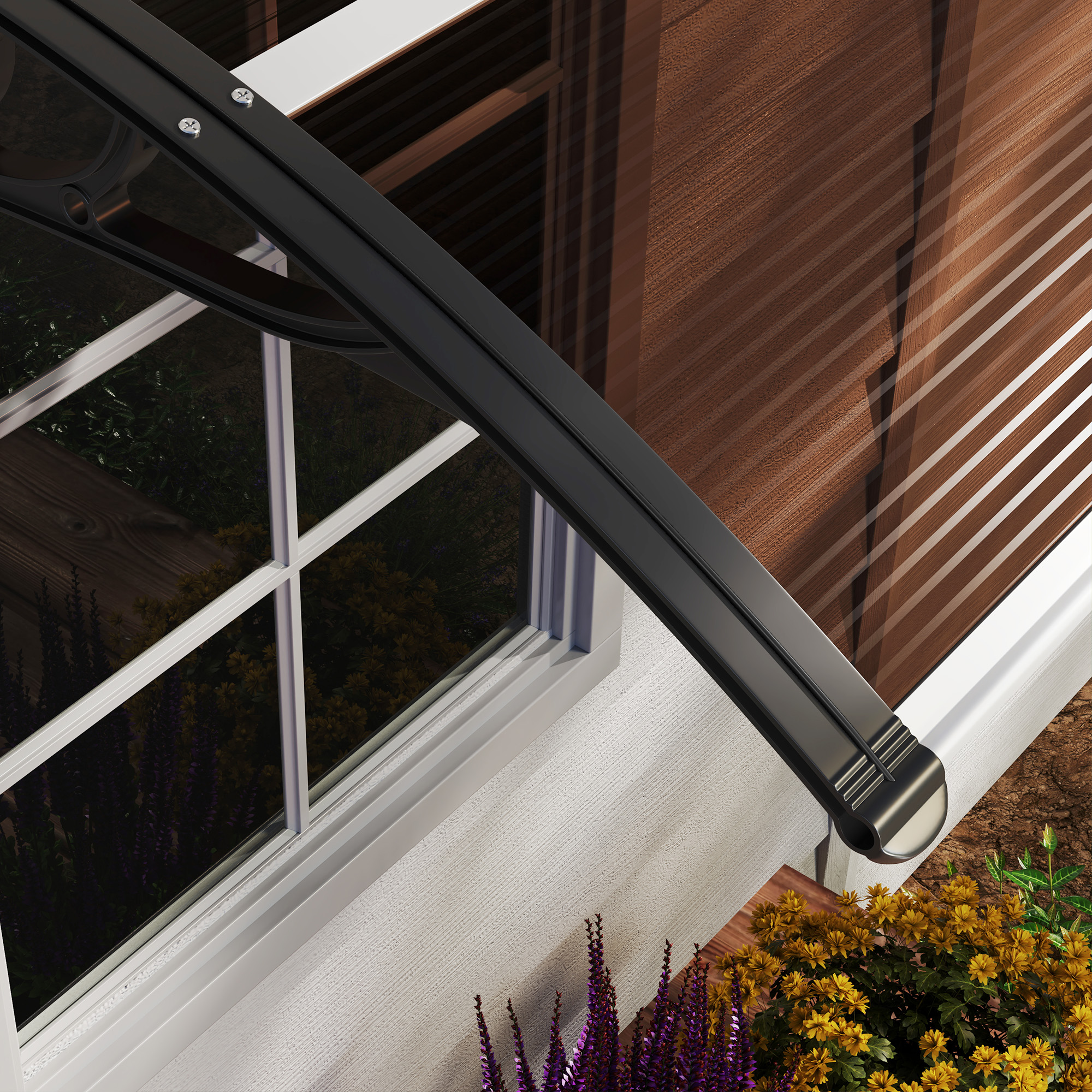 Nahaufnahme einer Markise mit Fenster im Hintergrund und Blumen im Vordergrund.