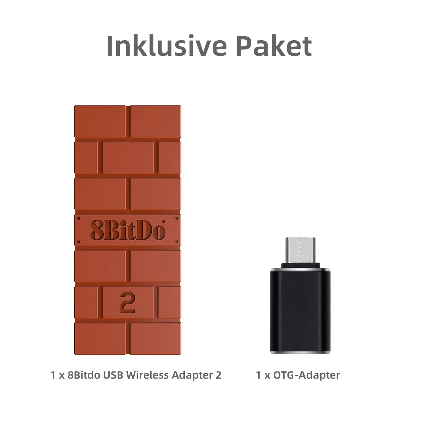 Zwei Geräte: ein ziegelsteinförmiger Adapter und ein schwarzer OTG-Adapter auf weißem Untergrund.