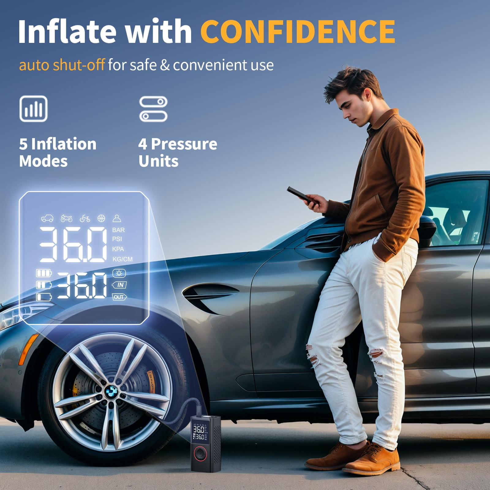 Ein Mann benutzt sein Telefon neben einem Auto, das von einer schwarzen Luftpumpe mit digitaler Anzeige aufgepumpt wird.