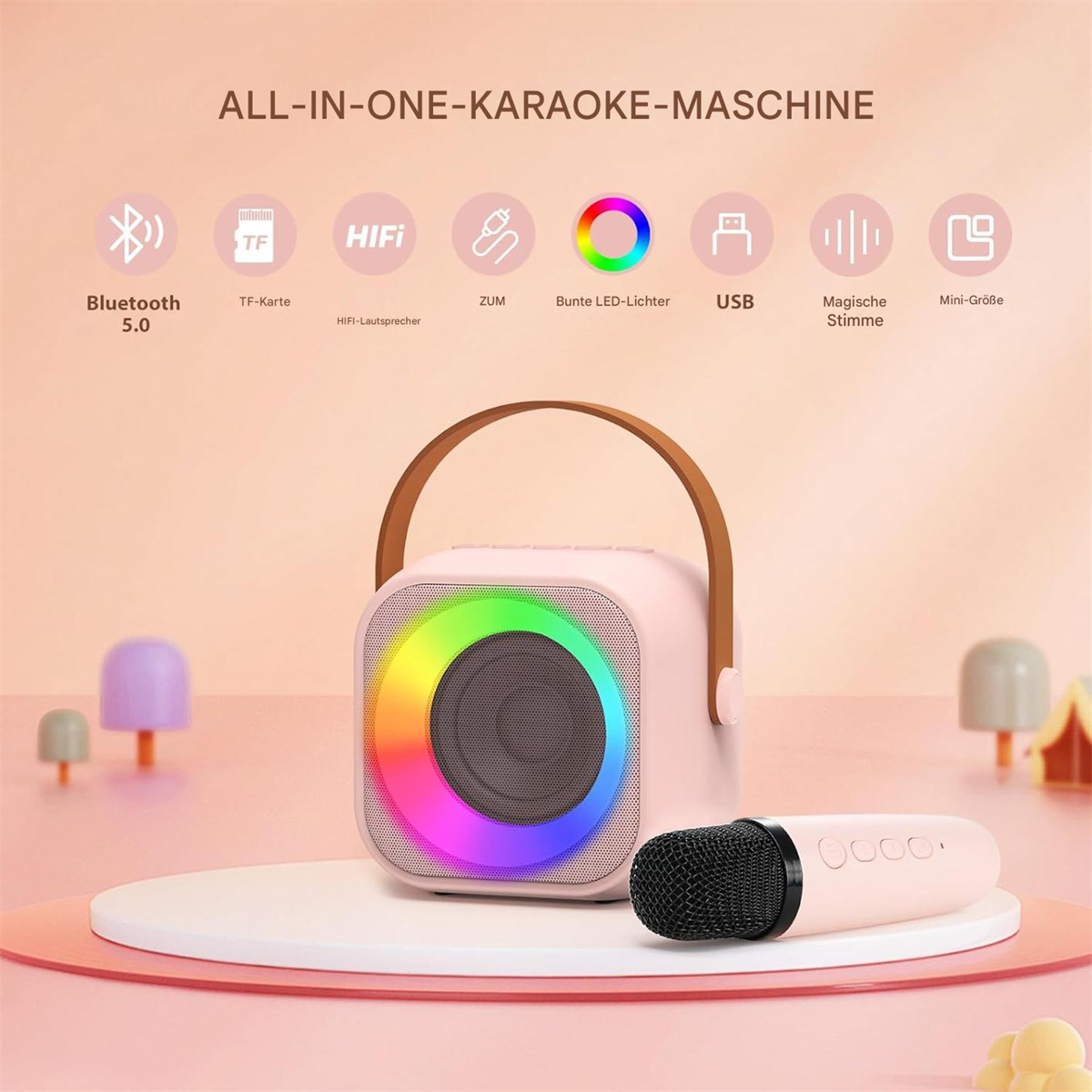 Rosa Karaoke-Maschine mit Griff und Mikrofon, mit Regenbogen-Lichtanzeige.