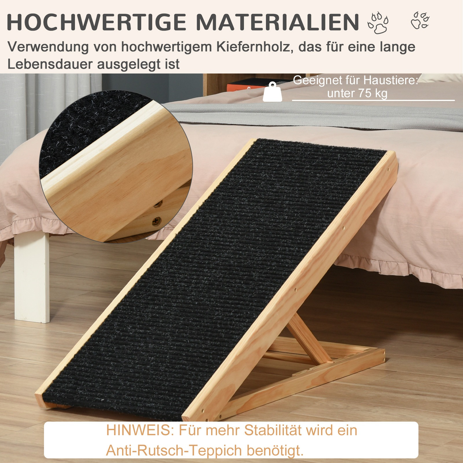 Hunderampe aus Holz mit schwarzer Oberfläche, Nahaufnahme des Holzes und ein Bett.
