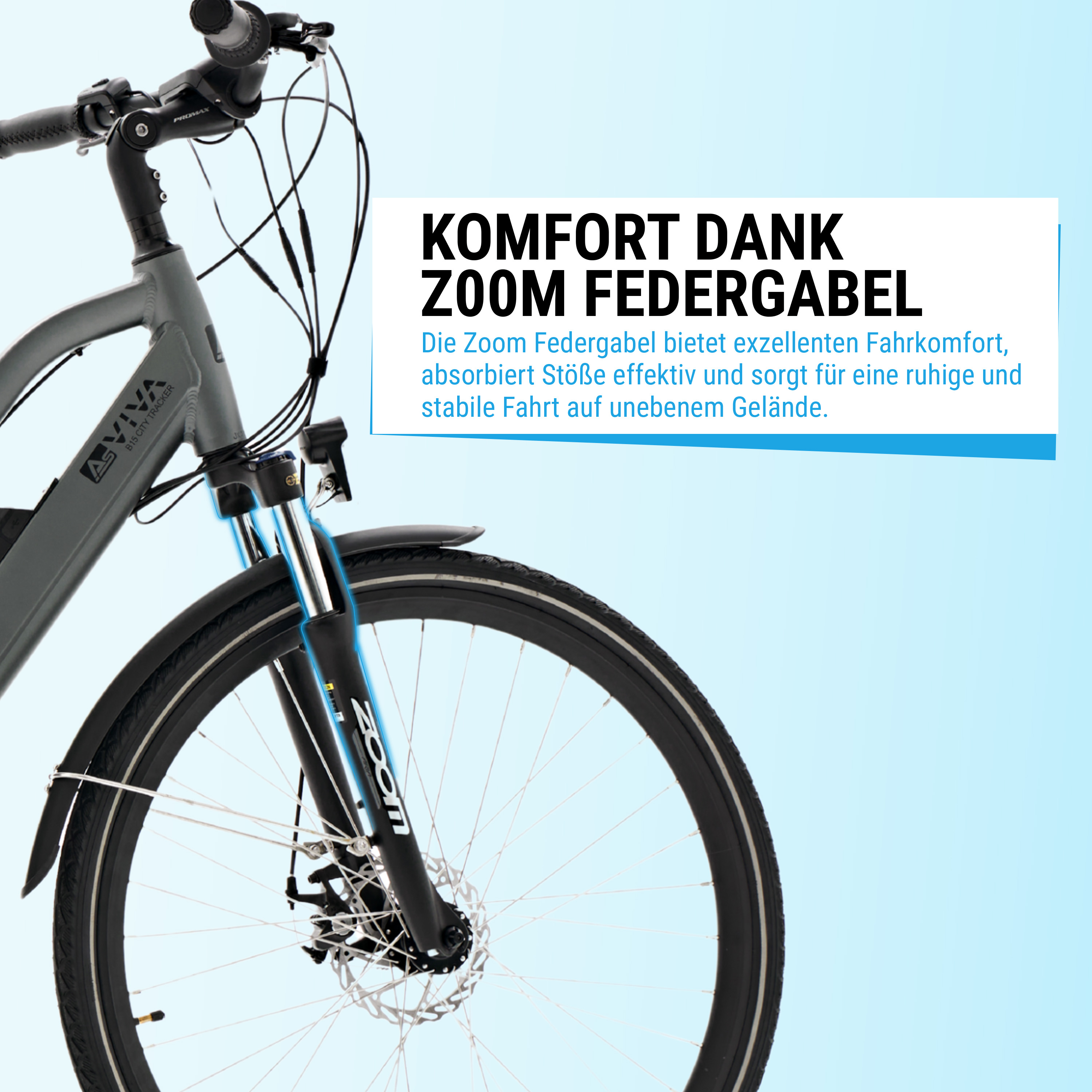 Nahaufnahme des Vorderrads eines grau-schwarzen Fahrrads. Text: Komfort dank ZOOM-Federgabel.