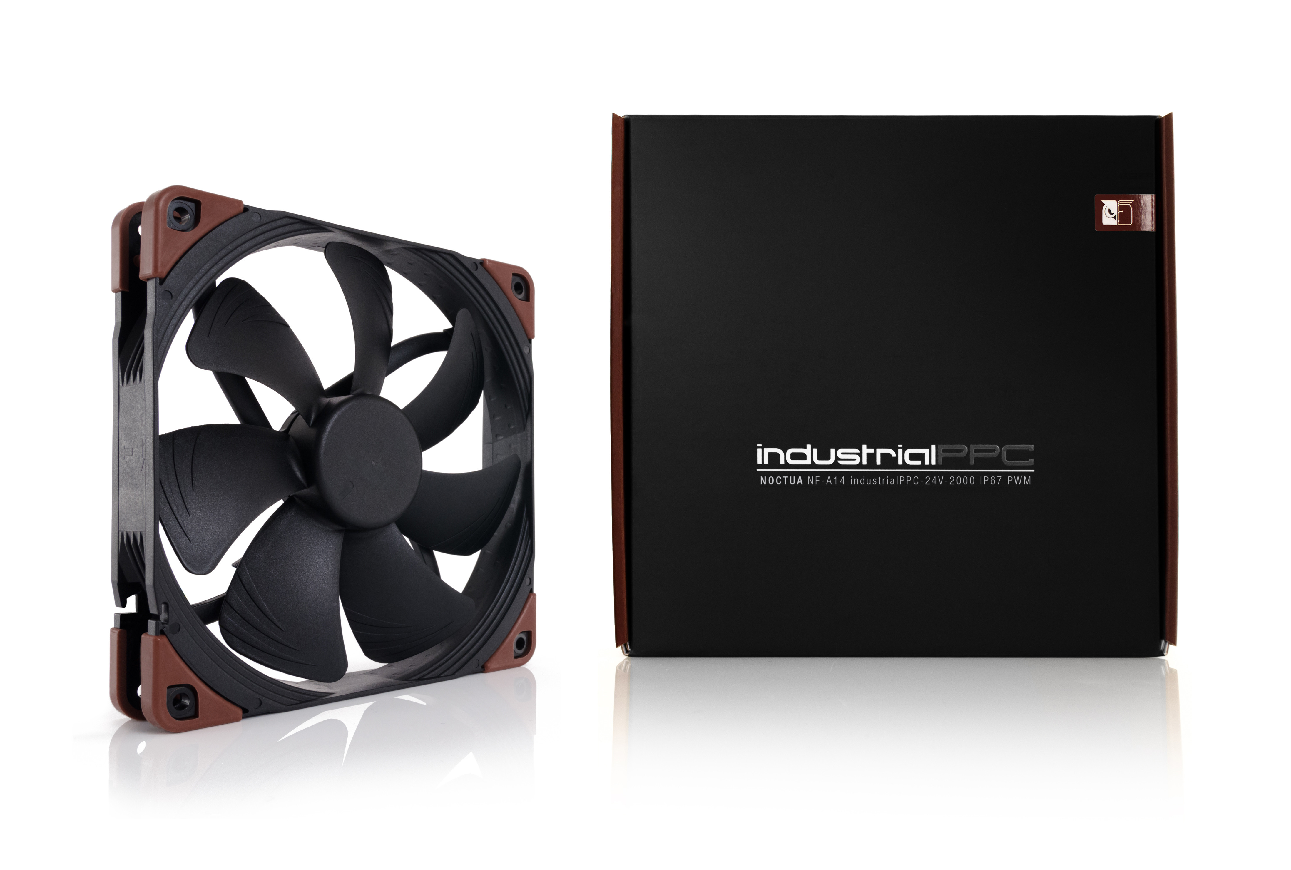 PC fan, black blades with brown frame, next to black box with text.
