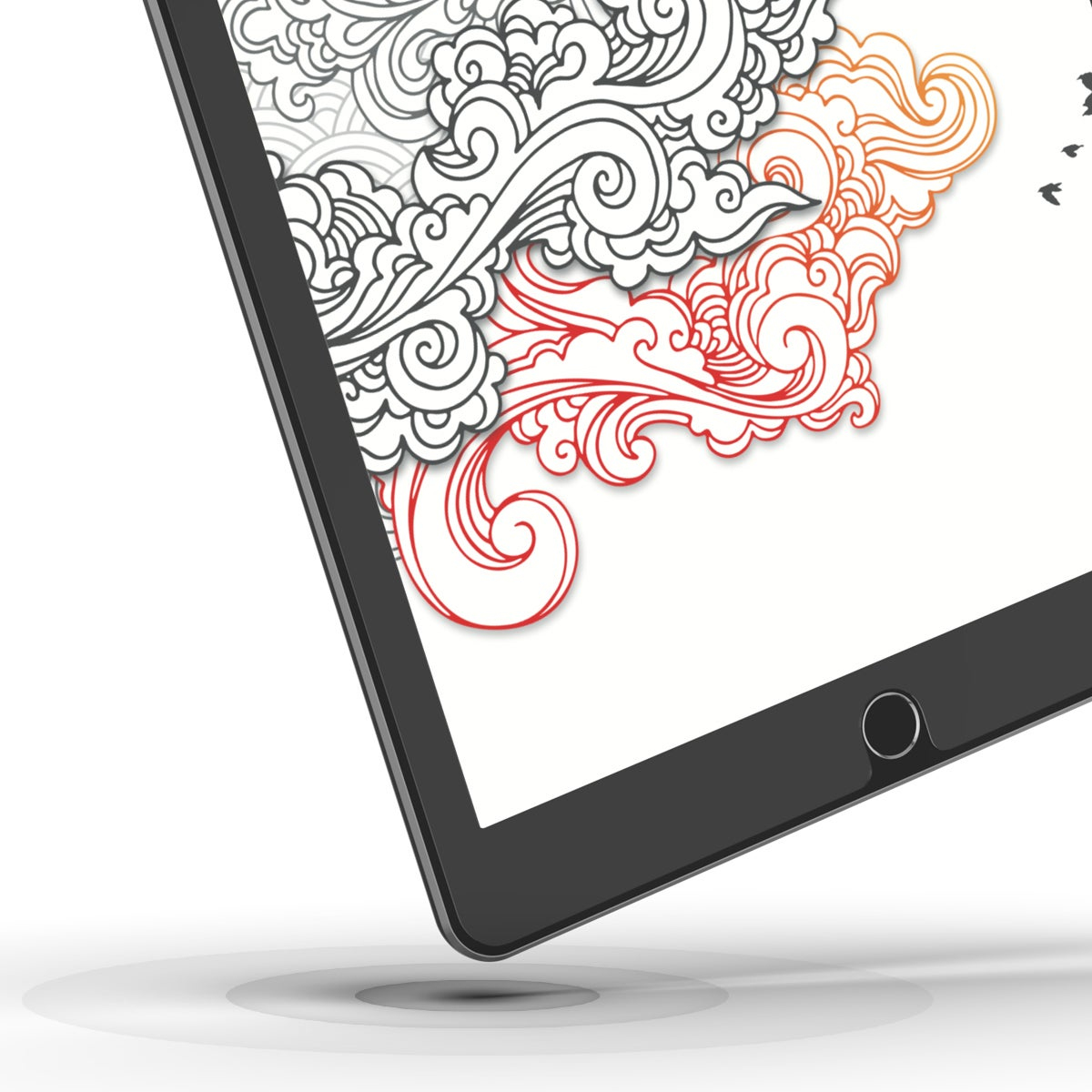 Tablet pod kątem, pokazujący dekoracyjny wzór na ekranie.