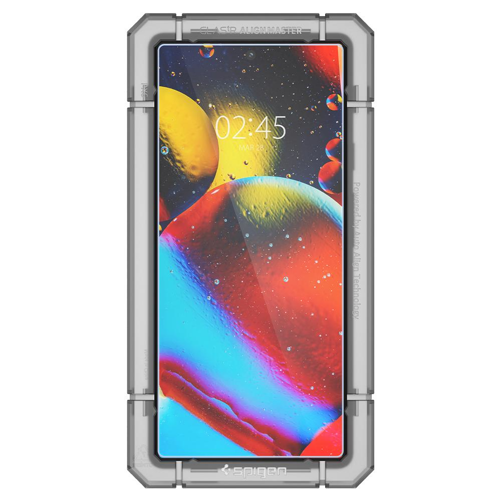 Smartfon z ramką do nakładania folii ochronnej. Ekran pokazuje kolorowe abstrakcyjne tło.