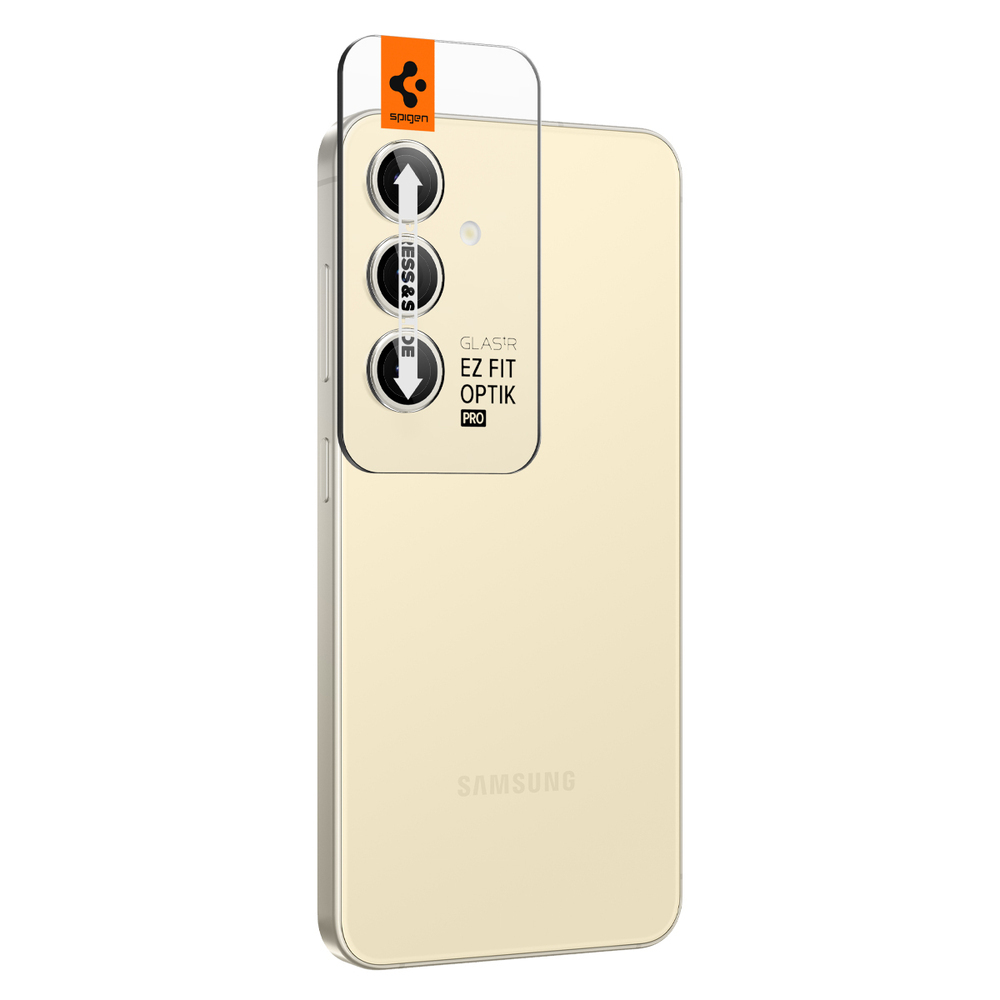 Telefono dorato con protezione obiettivo fotocamera installata. Protezione con testo, premi e scorri, sul retro.