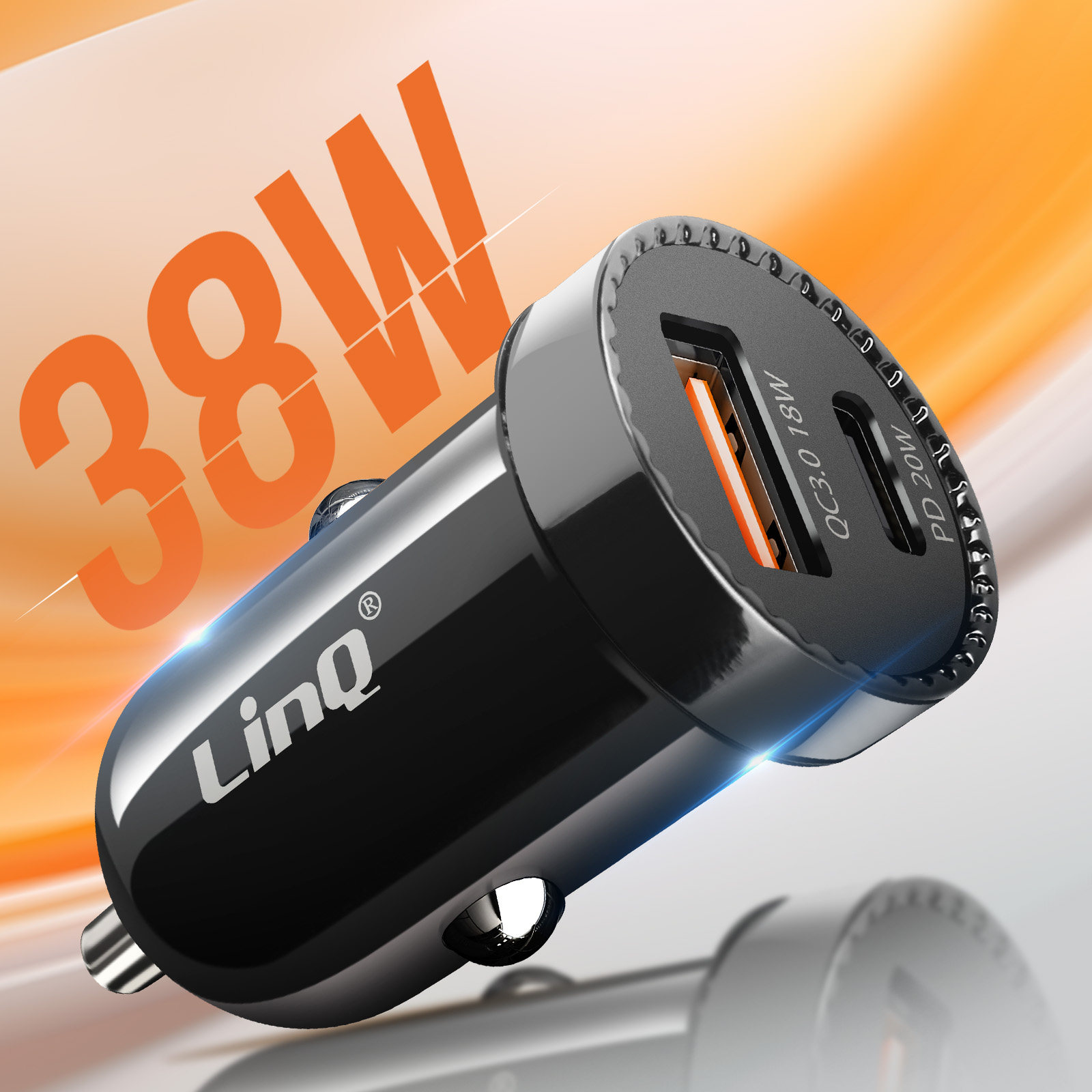 Cargador de coche negro con dos puertos y una etiqueta de 38W. El cargador está sobre un fondo degradado naranja.