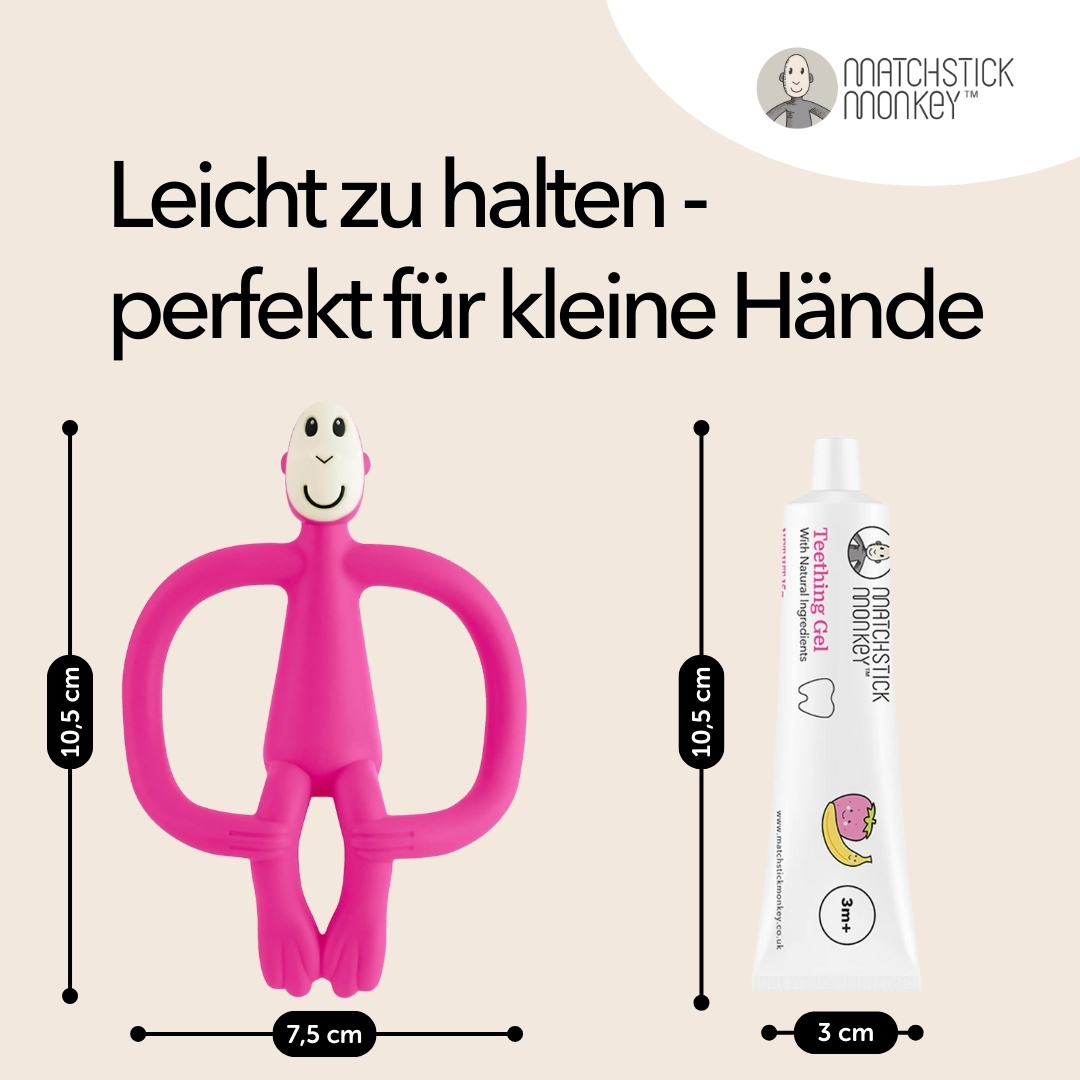 Rosa affenförmiges Beißspielzeug mit Abmessungen. Eine Tube Zahnungsgel ist ebenfalls abgebildet.
