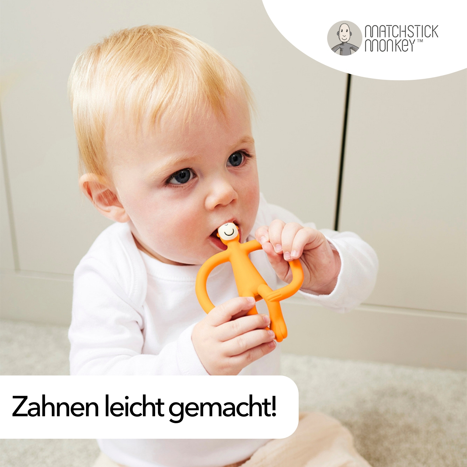 Baby mit orangenem Beißring-Spielzeug im Mund. Text sagt: Zahnen leicht gemacht!