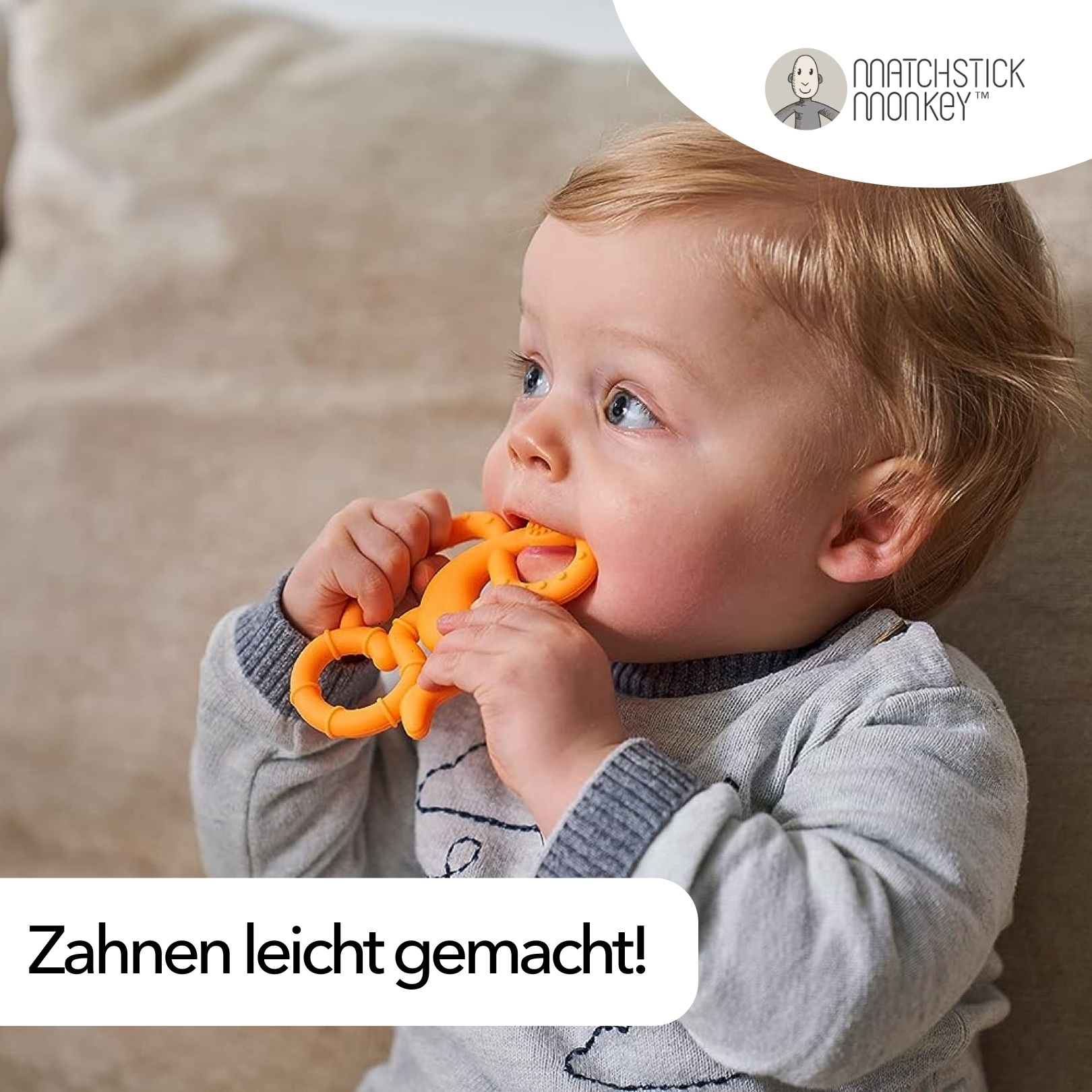 Baby kaut auf einem orangenen Beißring. Der Text 'Zahnen leicht gemacht!' steht unten.