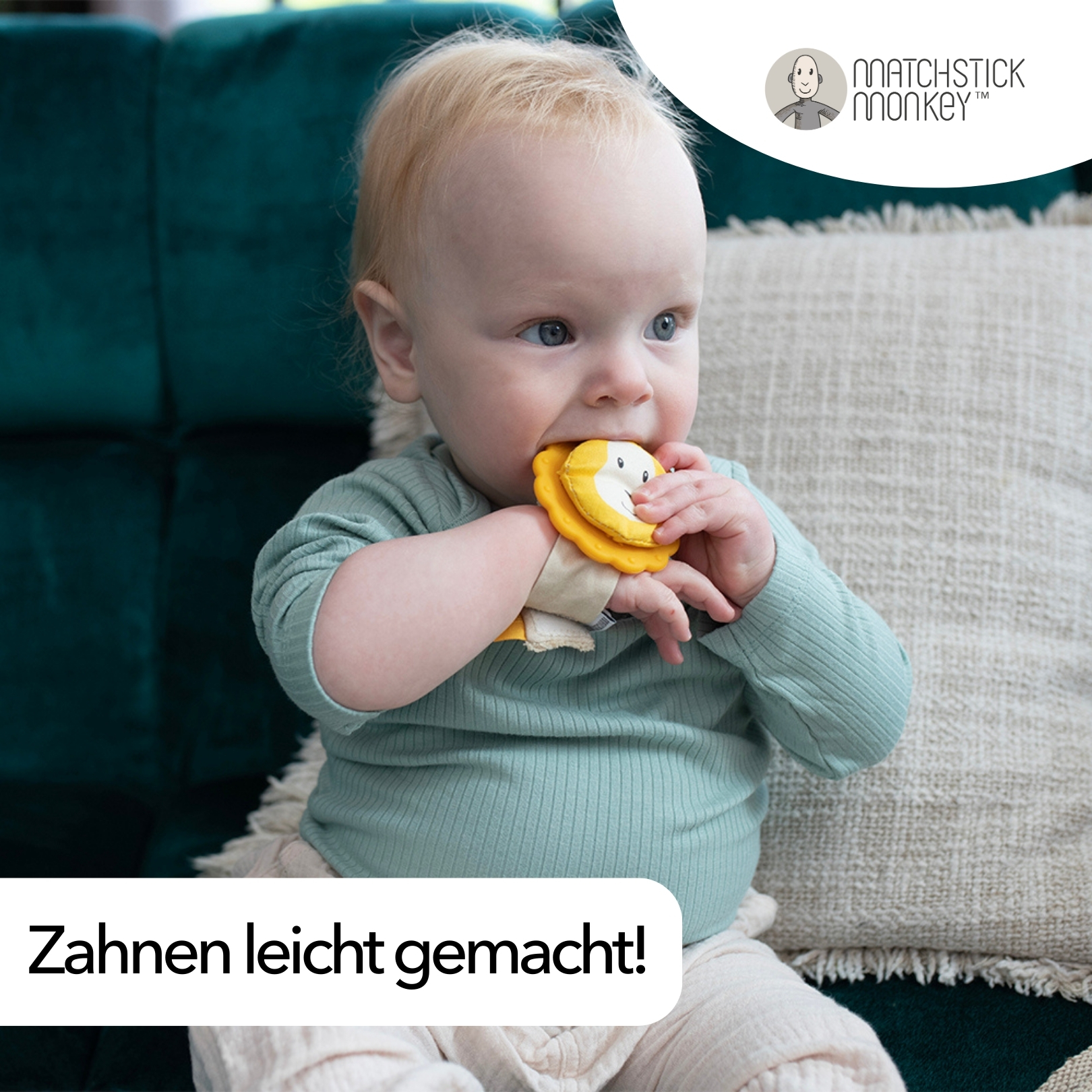 Ein Baby kaut auf einem Löwen-Handgelenk-Beißring. Der Text 'Zahnen leicht gemacht!' steht unten.