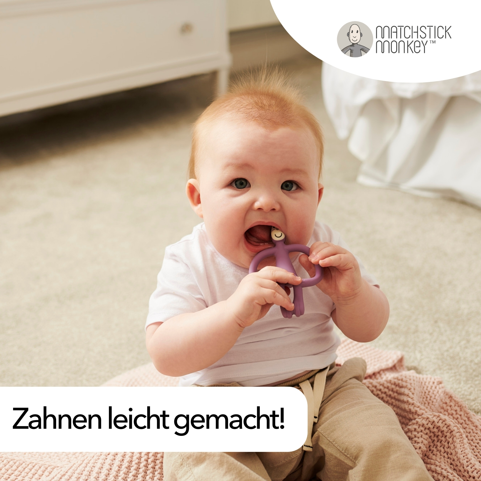 Baby mit lila Beißring. Text: Zahnen leicht gemacht!
