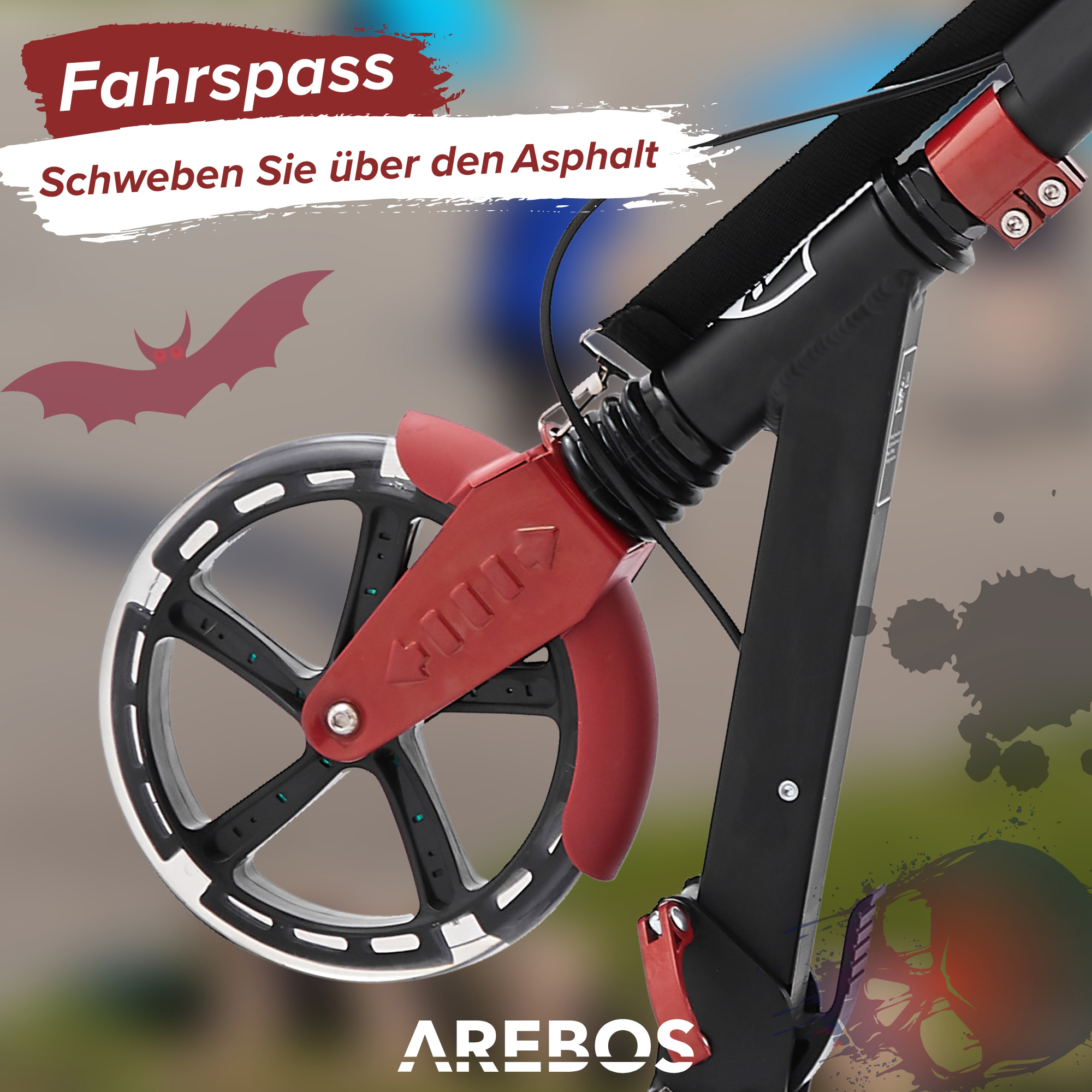 Nahaufnahme eines schwarz-roten Roller-Rads mit rotem Kotflügel.