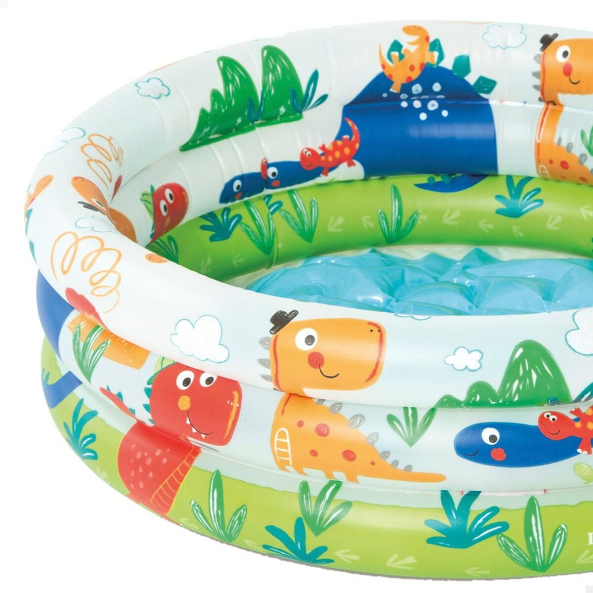 Primer plano de una piscina inflable colorida con dinosaurios. Fondo blanco. La piscina tiene tres anillos.