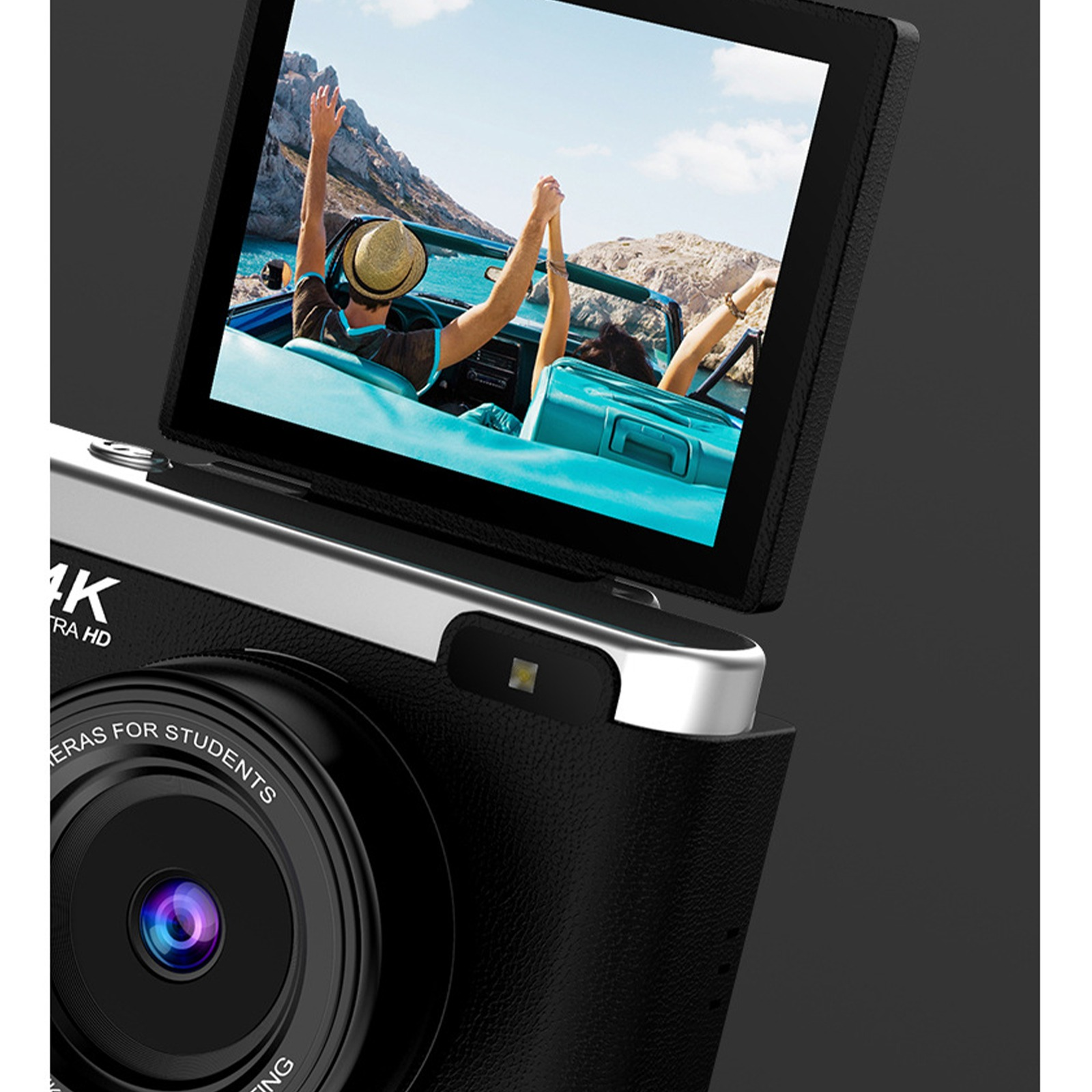 Schwarze Kamera mit Bildschirm, der Menschen in einem Auto zeigt. 4K Ultra HD, silbernes Oberteil.