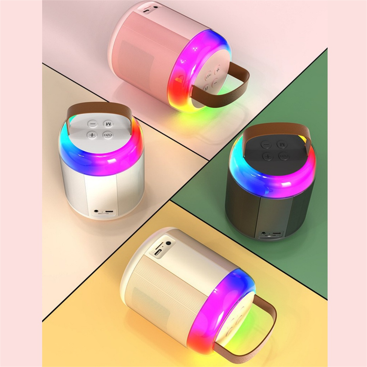 Vier Lautsprecher in verschiedenen Positionen. Alle sind weiß mit Regenbogen-LEDs und braunem Griff.