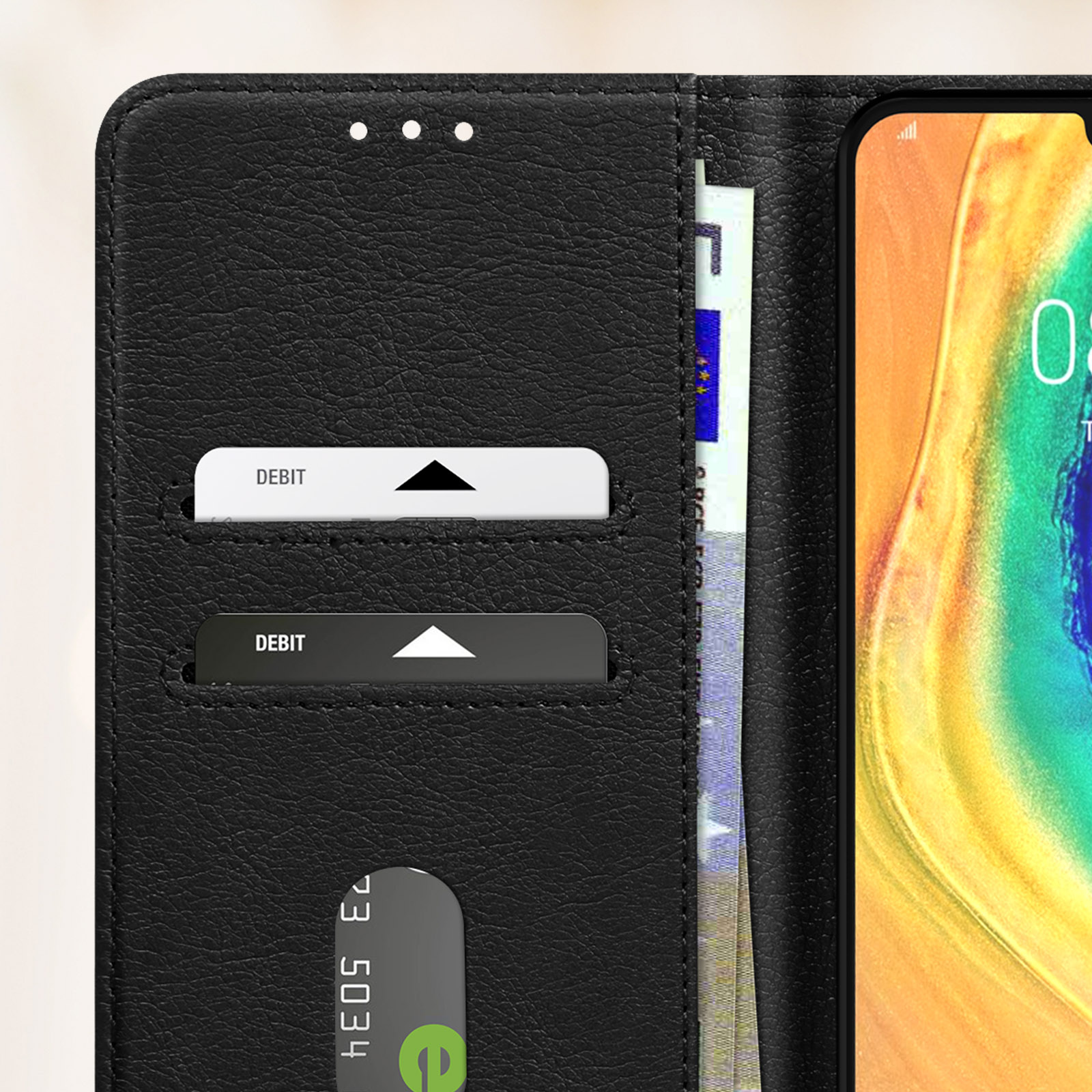 Custodia a portafoglio nera per telefono, con carte di debito e denaro.