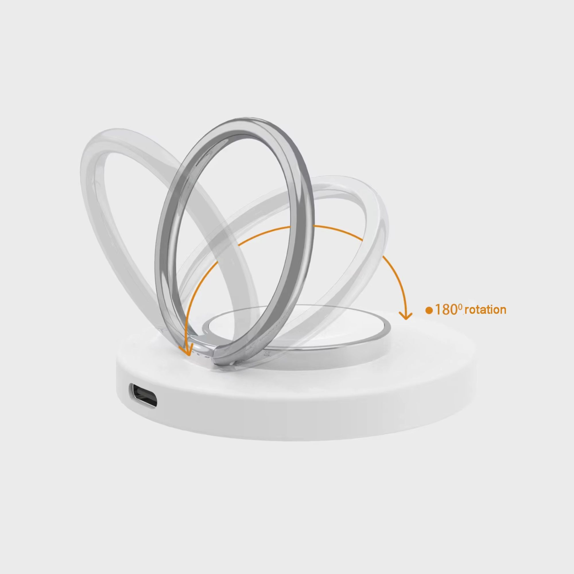Un soporte blanco para anillo de teléfono con un anillo plateado giratorio. Se indica una rotación de 180°.