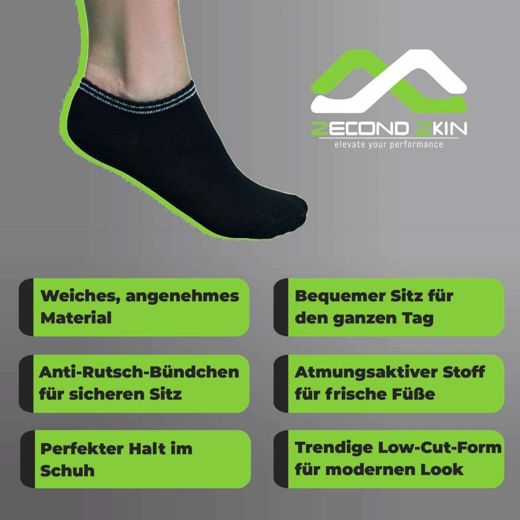 Schwarze Socken an einem Fuß, mit deutschem Text. Die Socken haben einen grünen und weißen Streifen.