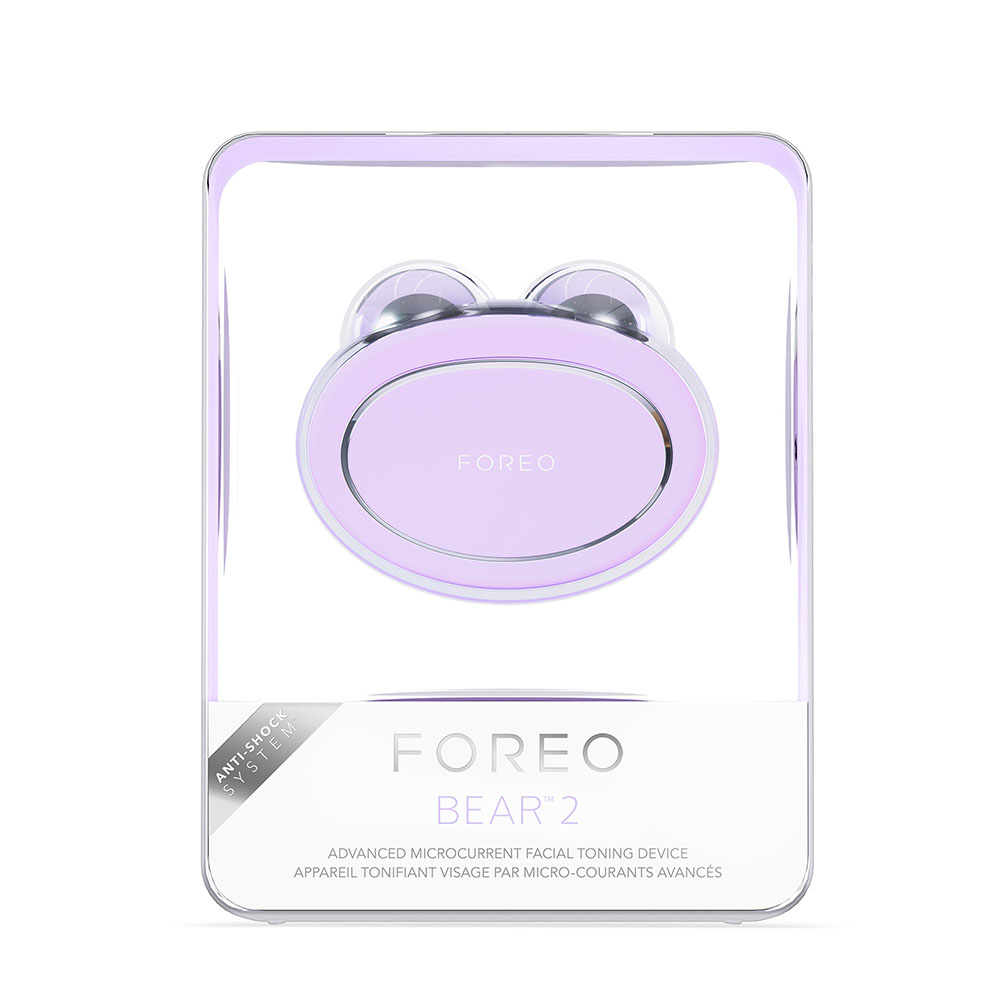 Un appareil Foreo Bear 2 lavande dans un emballage transparent. Pour tonifier le visage.