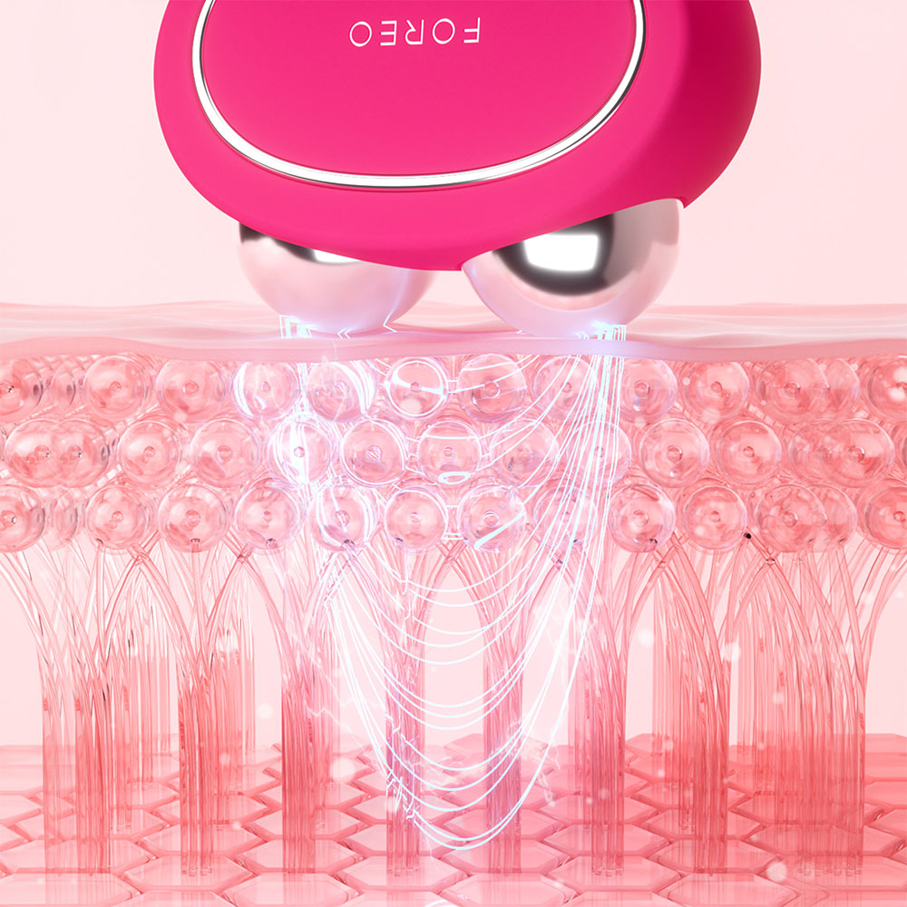 Close-up of a Foreo device with silver spheres, showing skin layers and energy lines.