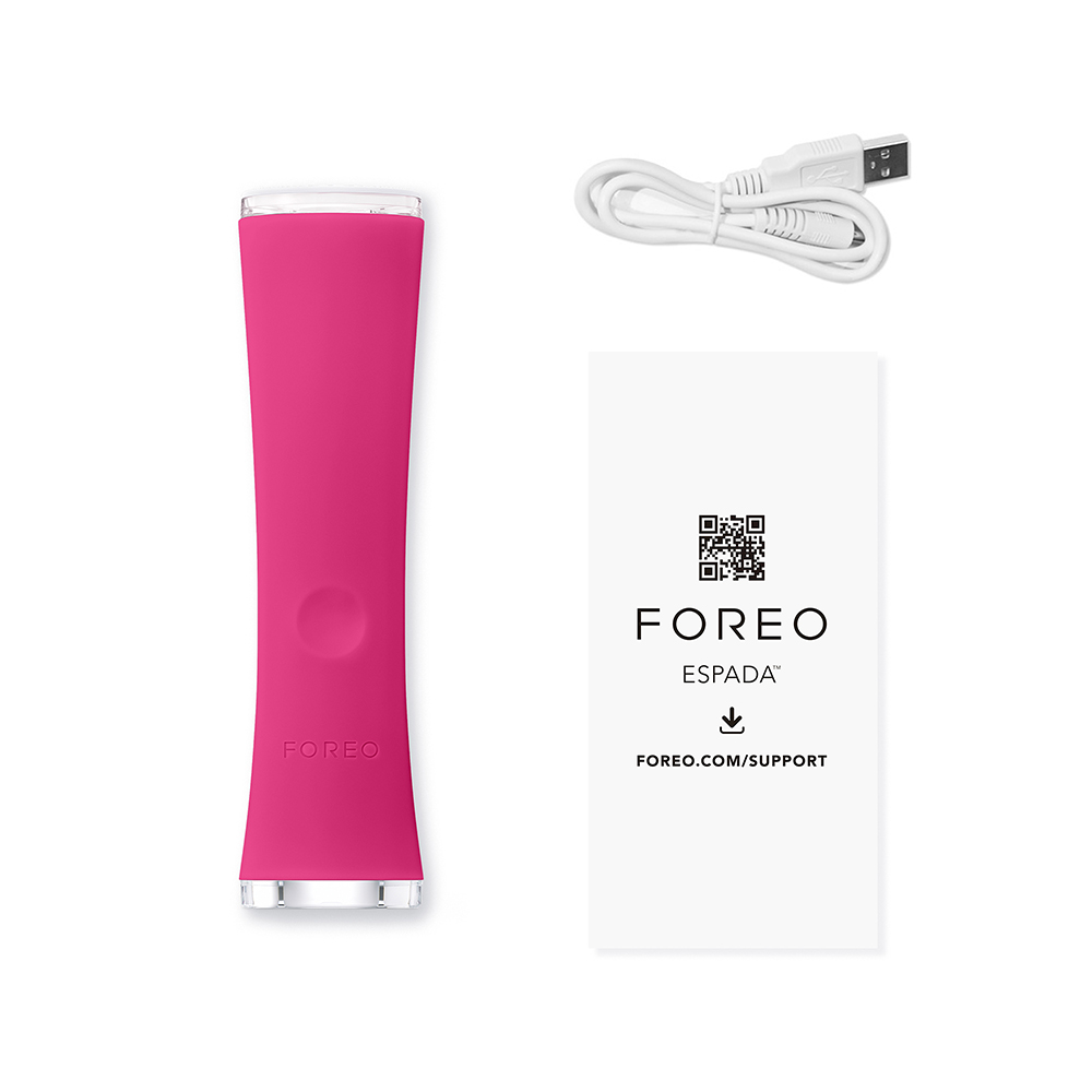 A pink Foreo Espada 2 device, a charging cable, and instructions on a white background.