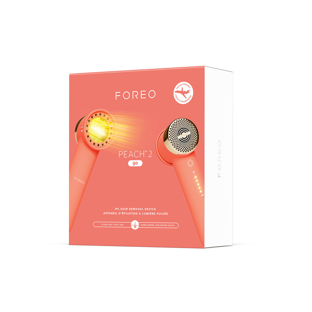 A Foreo PEACH 2 go device in a box. It is peach and white.