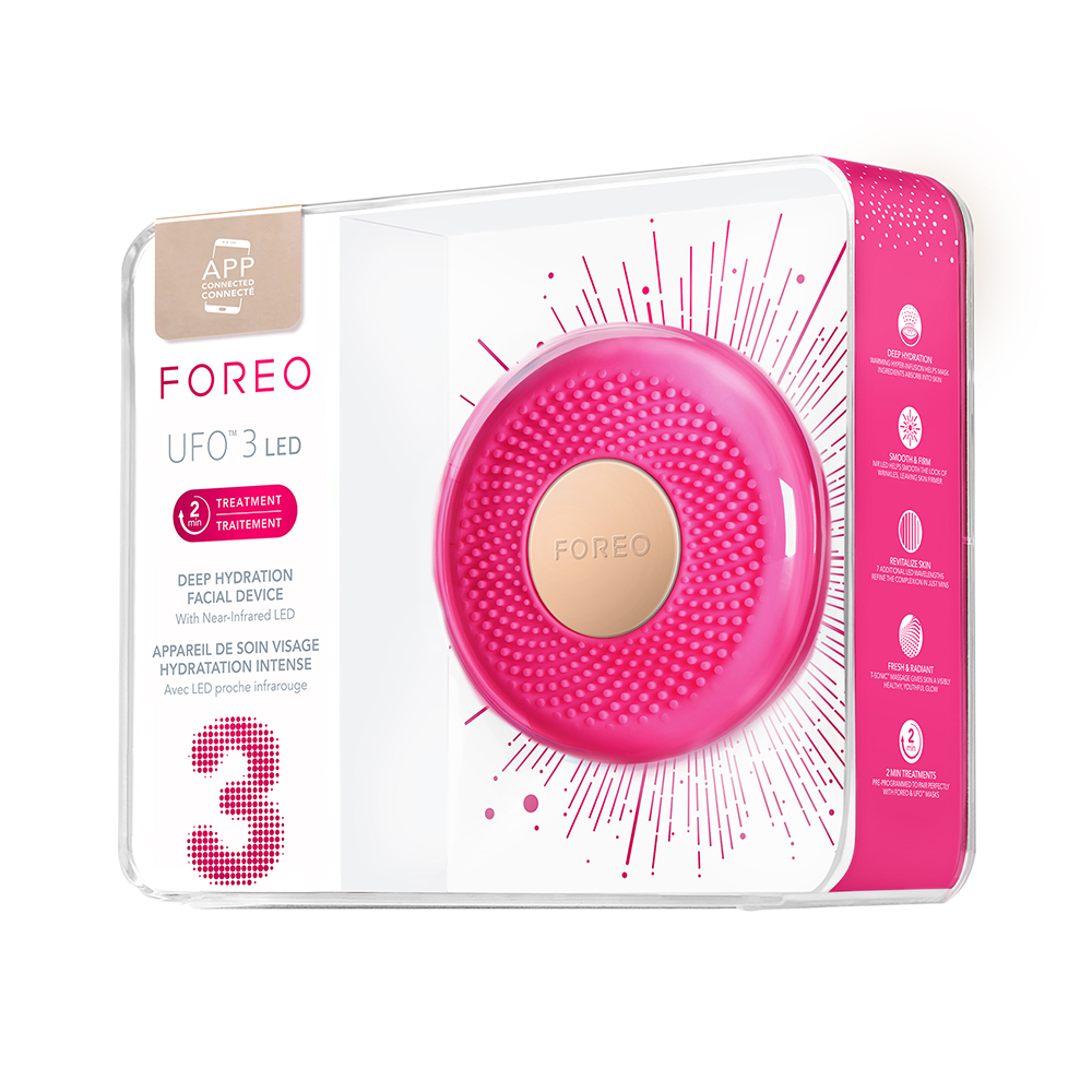 Pink Foreo UFO 3 LED device in a clear case. Its design shows a pink disk with a grid of small dots.
