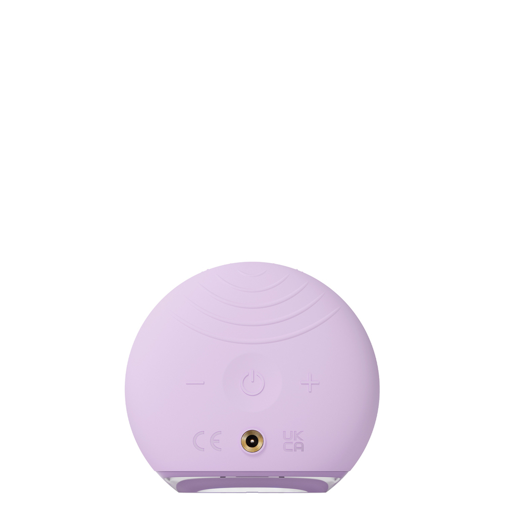Purple Foreo device bottom. White background.