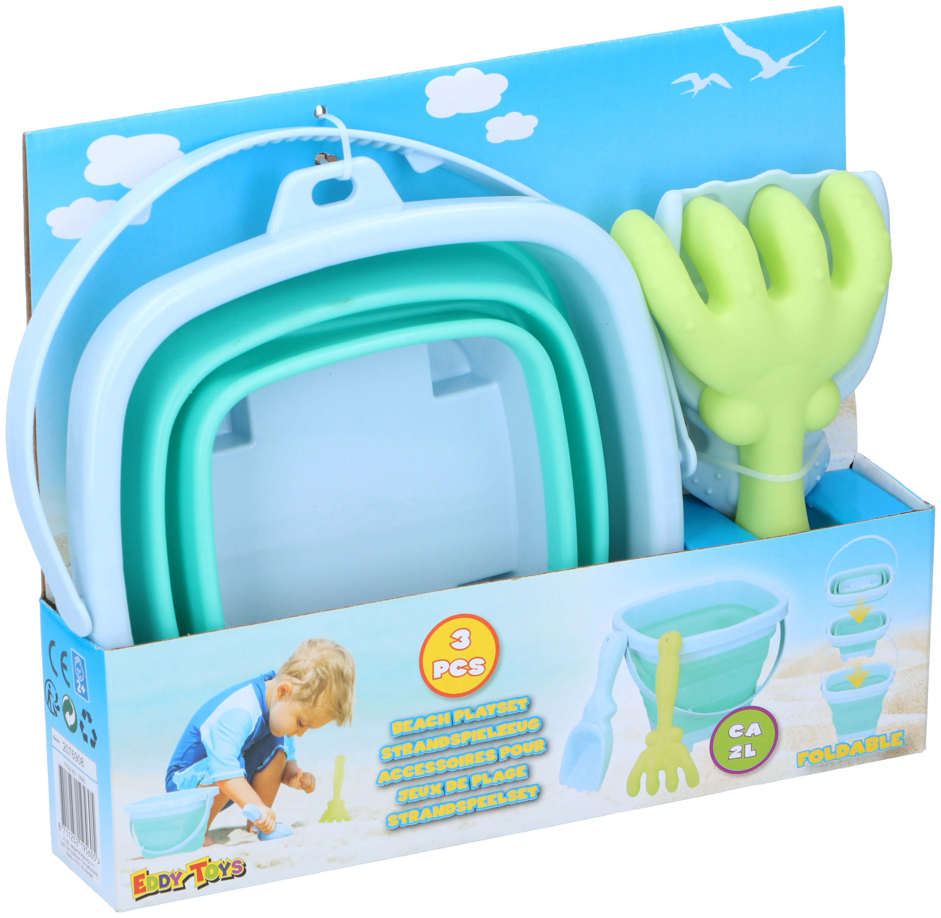 Beach playset with a foldable bucket, small rake, and shovel in a box. White background.