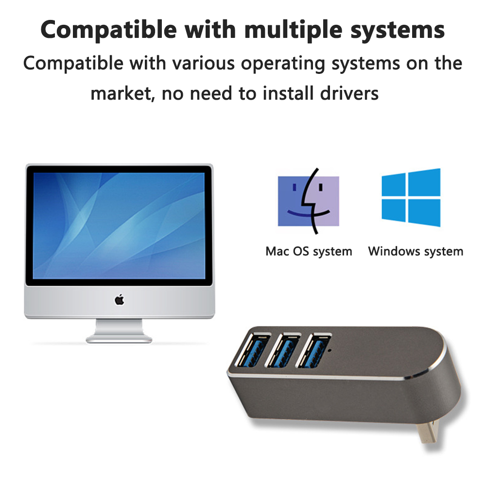 Ein USB-Hub mit drei Anschlüssen, mit einem Monitor und einem Laptop im Hintergrund.