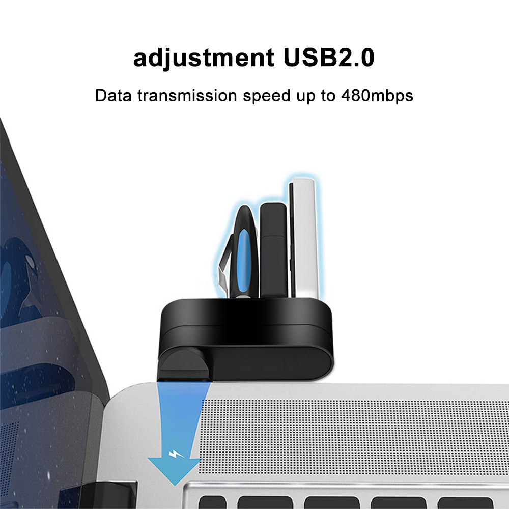 Ein USB-Hub, der an einen Laptop angeschlossen ist, mit USB-Sticks und einem Stift oben drauf.