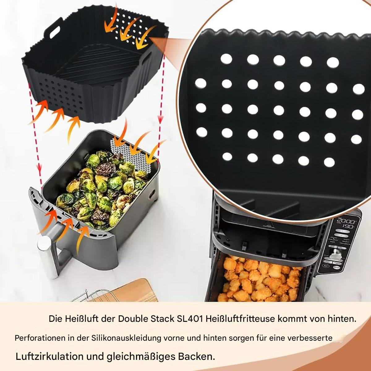 Schwarzer Heißluftfritteusenkorb mit Essen. Die Szene zeigt Luftzirkulation und gleichmäßiges Backen.