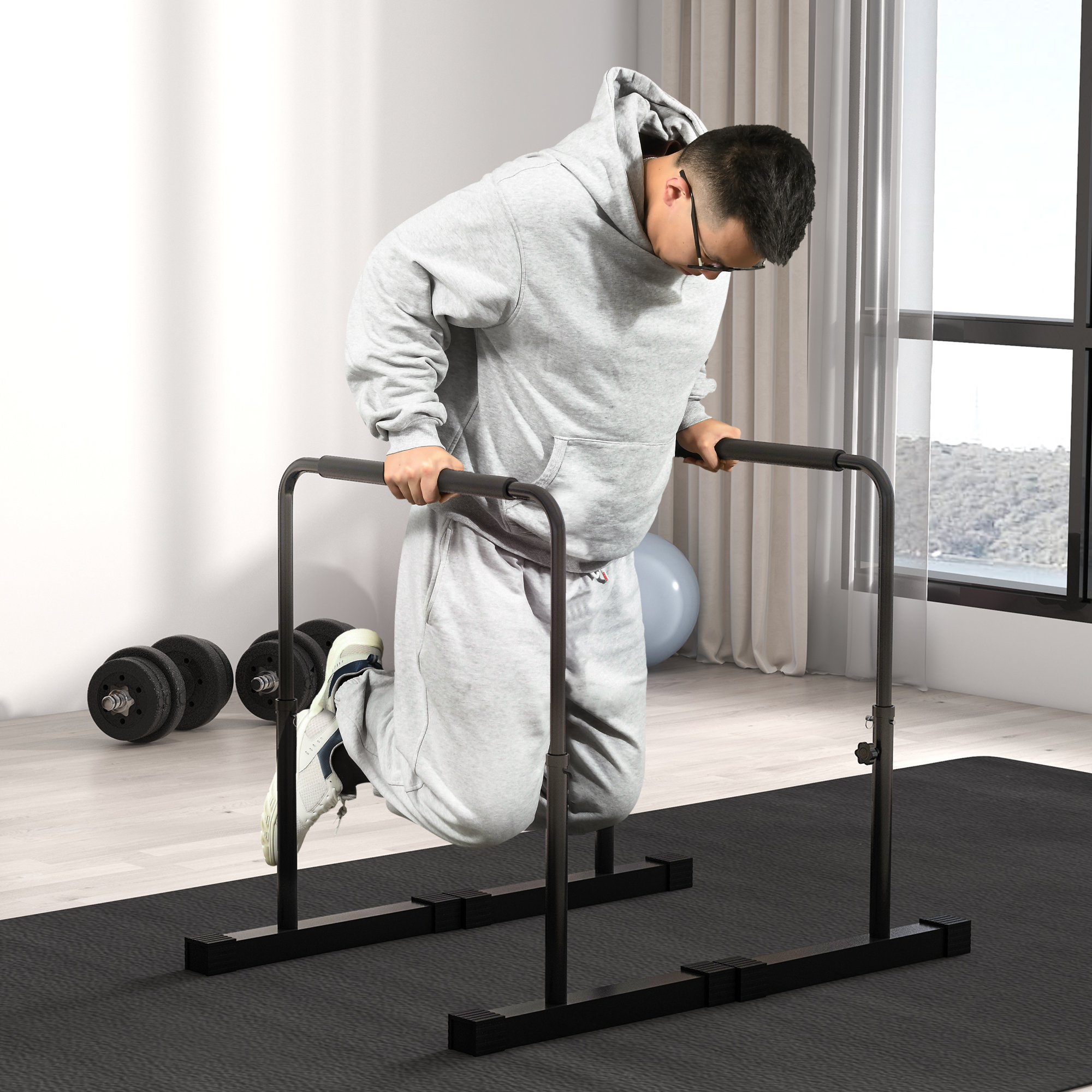 Mann macht Dips an schwarzen Klimmzugstangen in einem Home-Gym.