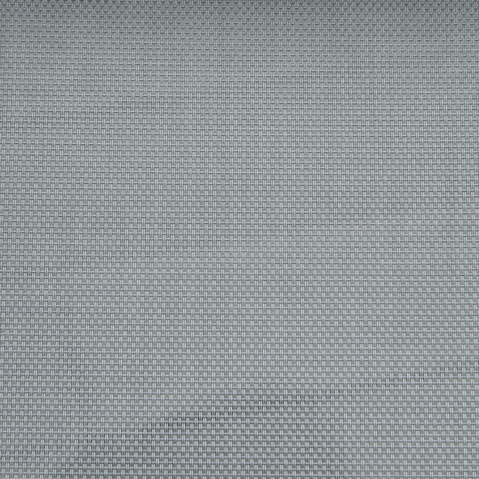 Nahaufnahme einer grauen gewebten Matte. Die Textur ist detailliert und bedeckt den gesamten Rahmen.