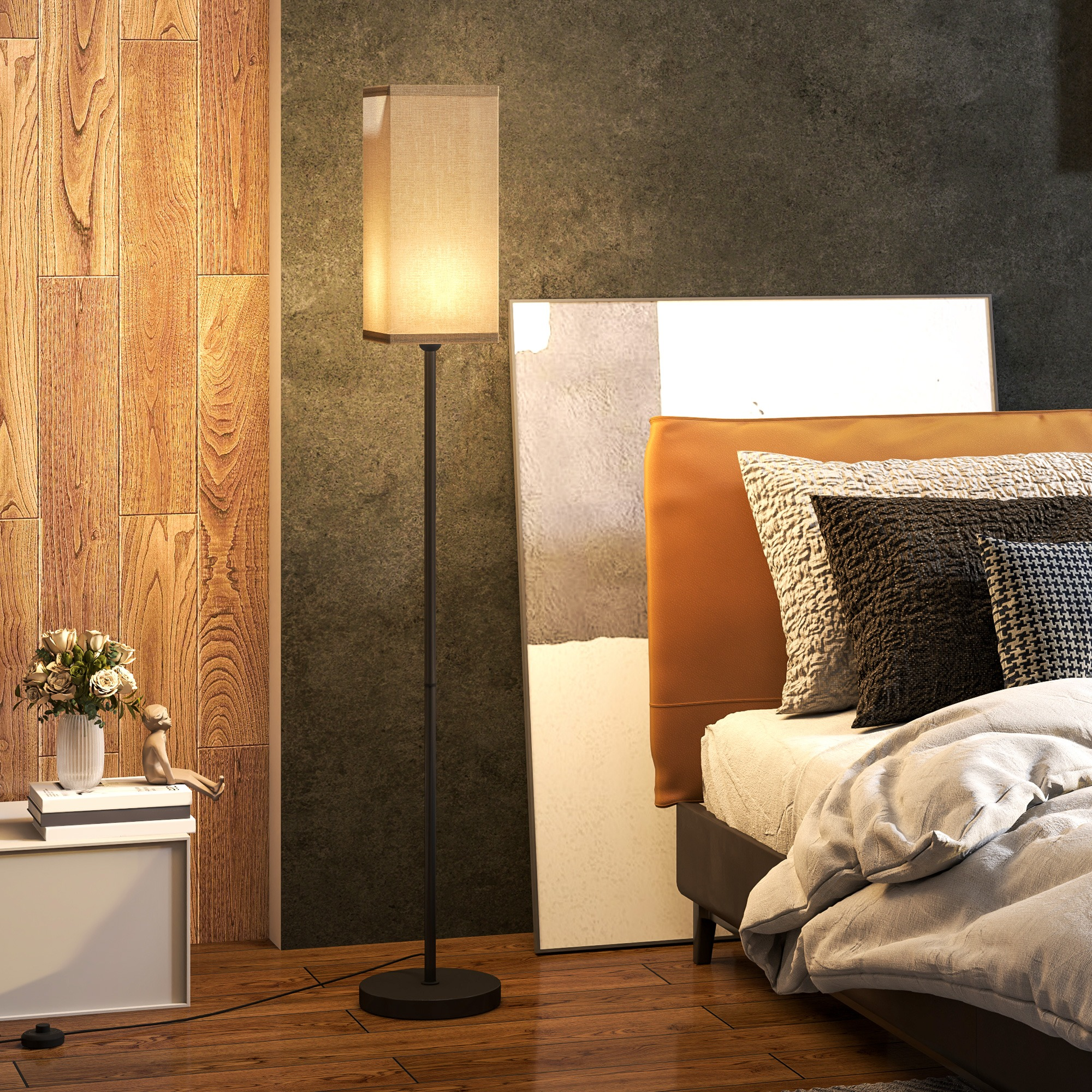 Schlafzimmer mit Stehlampe, Bett, Kunst und Beistelltisch mit Blumen vor Holz- und dunklen Wänden.