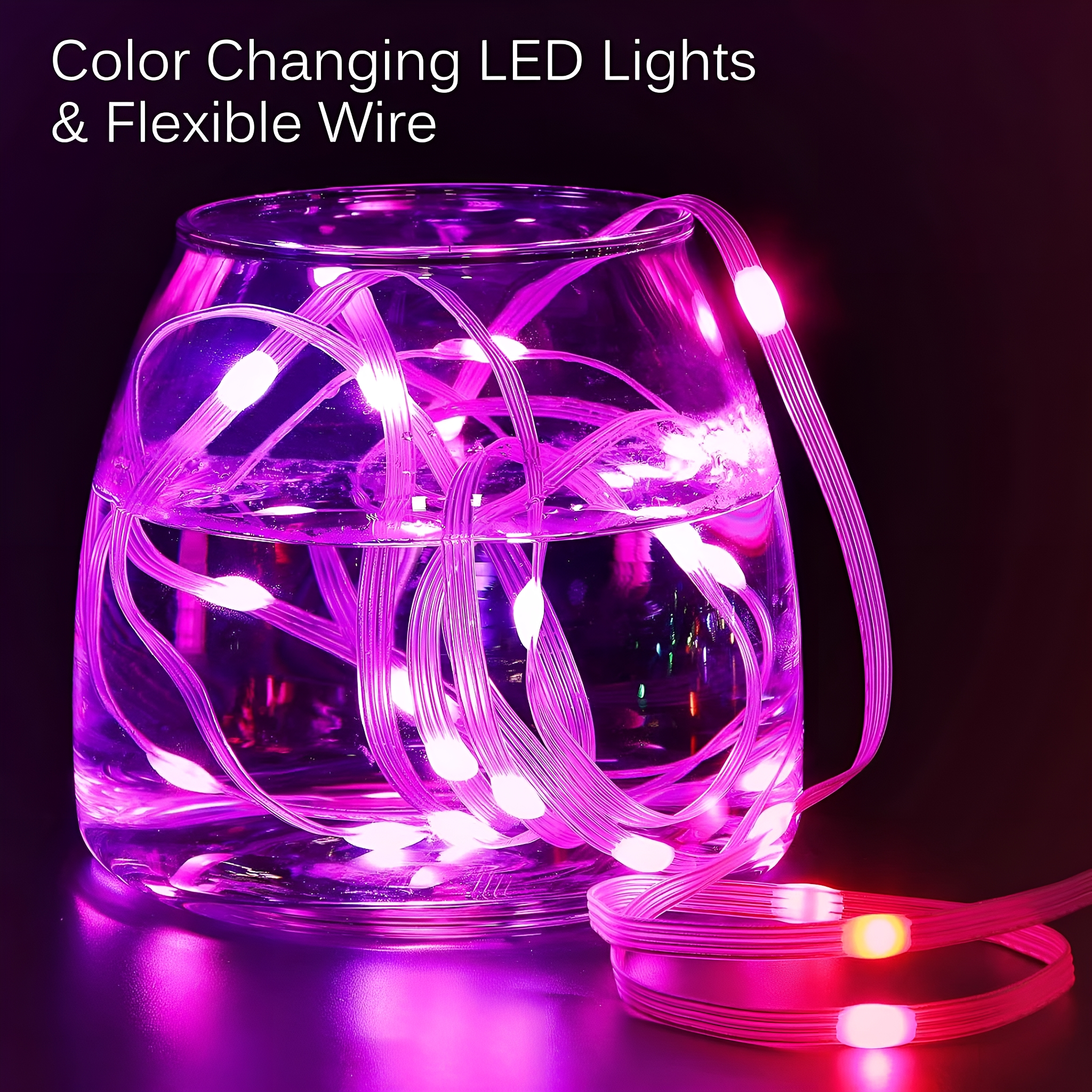 Glas mit pinkfarbenen LED-Leuchten, flexiblem Draht und dunklem Hintergrund.