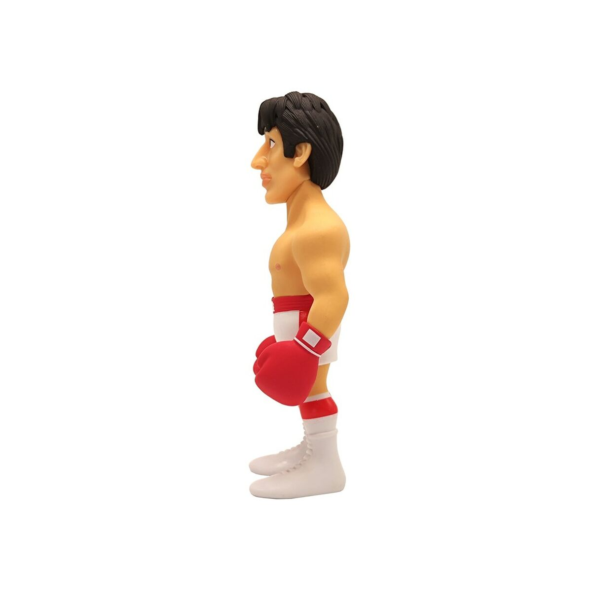 Una vista lateral de una figura de Rocky Balboa. Está sin camisa, con pantalones cortos y guantes rojos, con zapatos blancos.