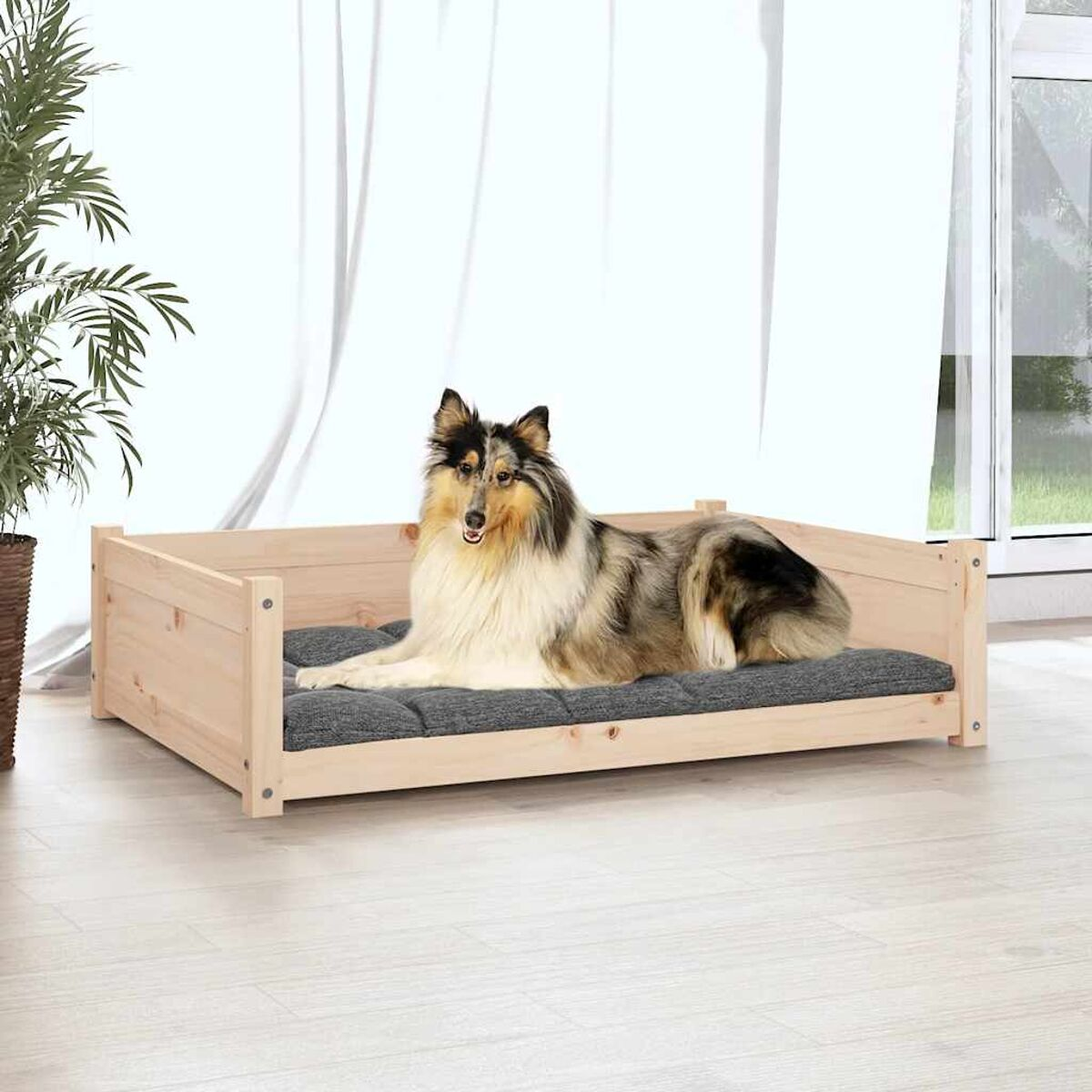 Ein Set von Gartenmöbeln mit einem schwarzen Tisch und Stühlen mit weißen Kissen.