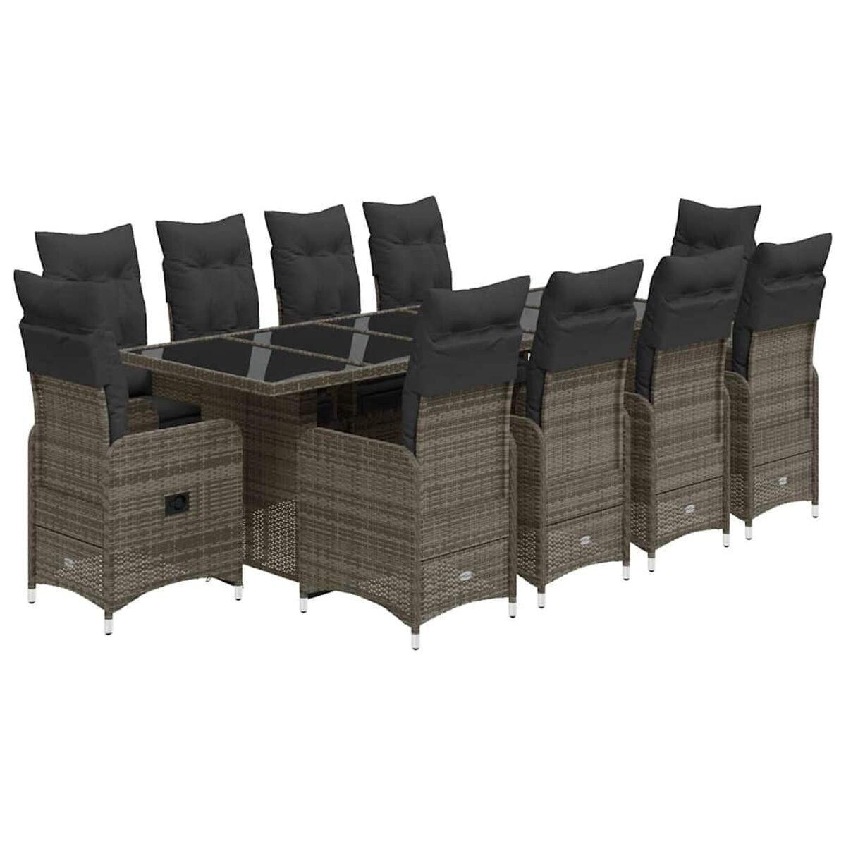 Set di mobili da patio in vimini con cuscini attorno a un tavolo con piano in vetro.