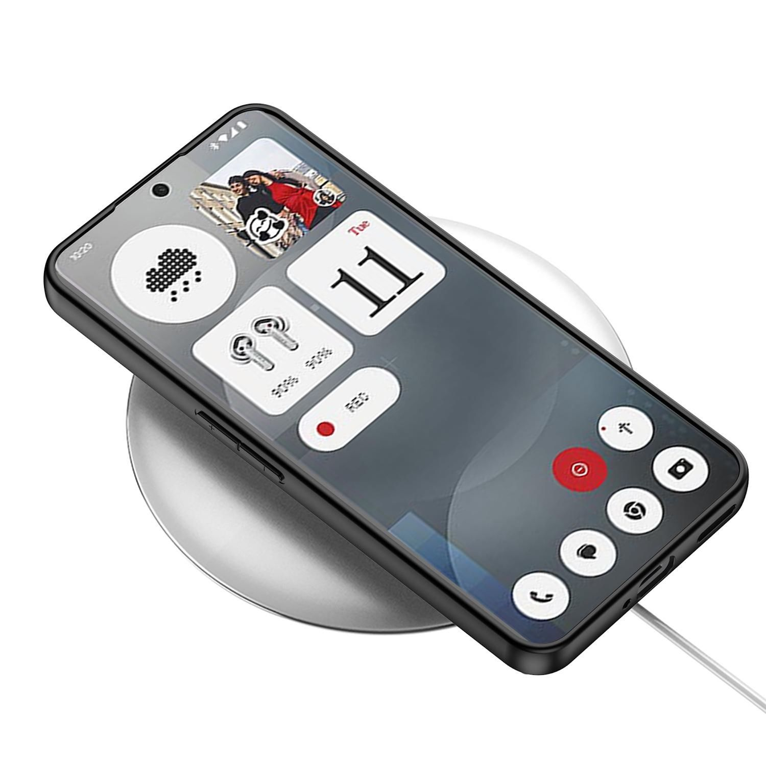 Ein schwarzes Telefon auf einem kabellosen Ladegerät. Das Telefon zeigt einen Startbildschirm mit Symbolen.