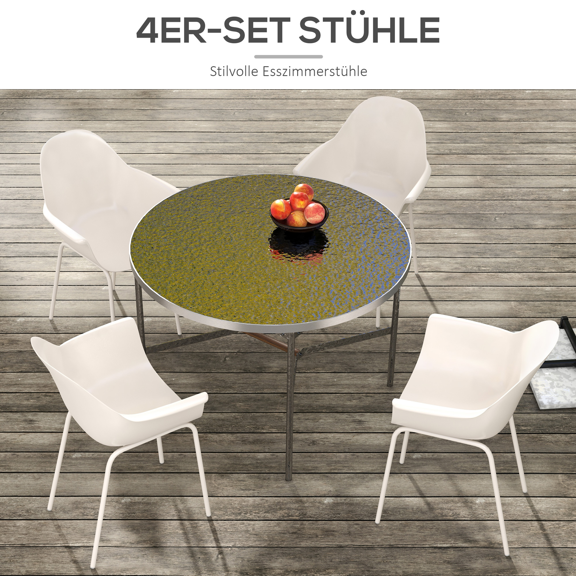 Vier weiße Stühle um einen runden Tisch. Rote Äpfel liegen auf dem Tisch.