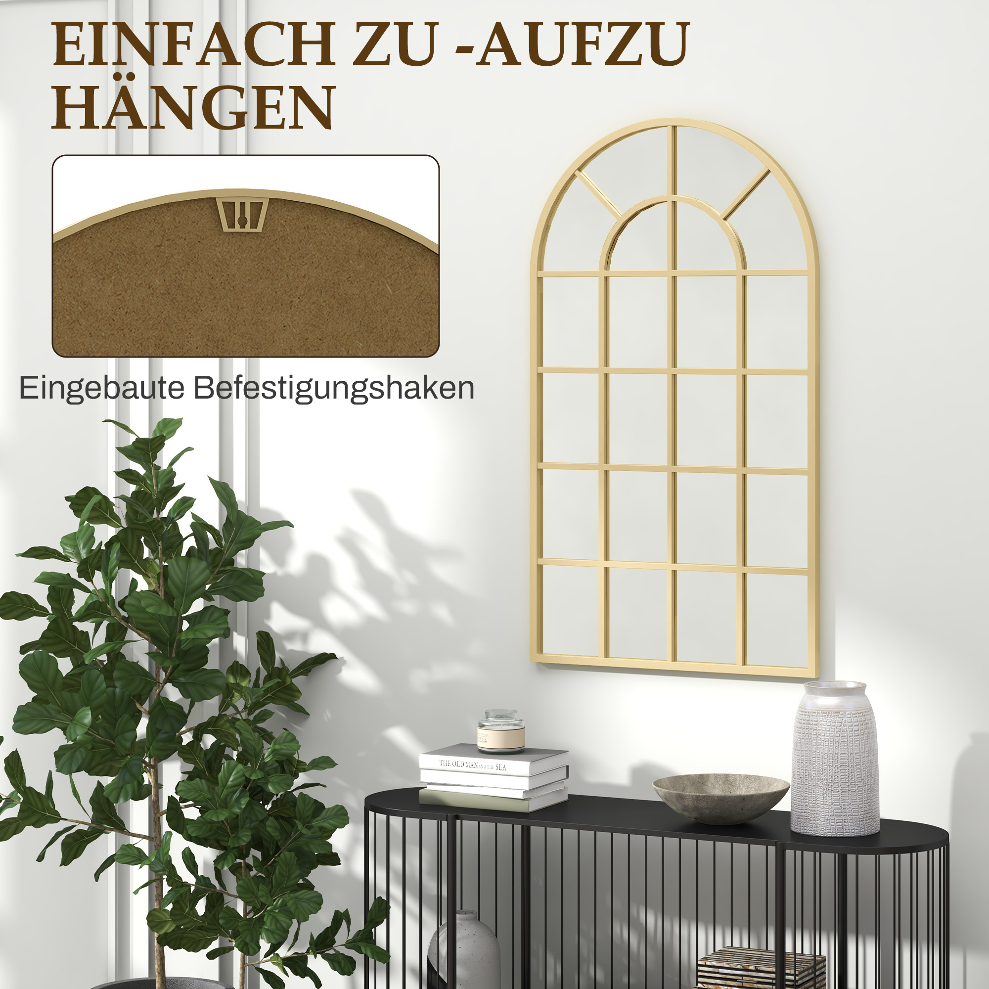 Goldener Bogenförmiger Spiegel an weißer Wand mit Pflanze links und Text oben. Dekorativ und einfach aufzuhängen.